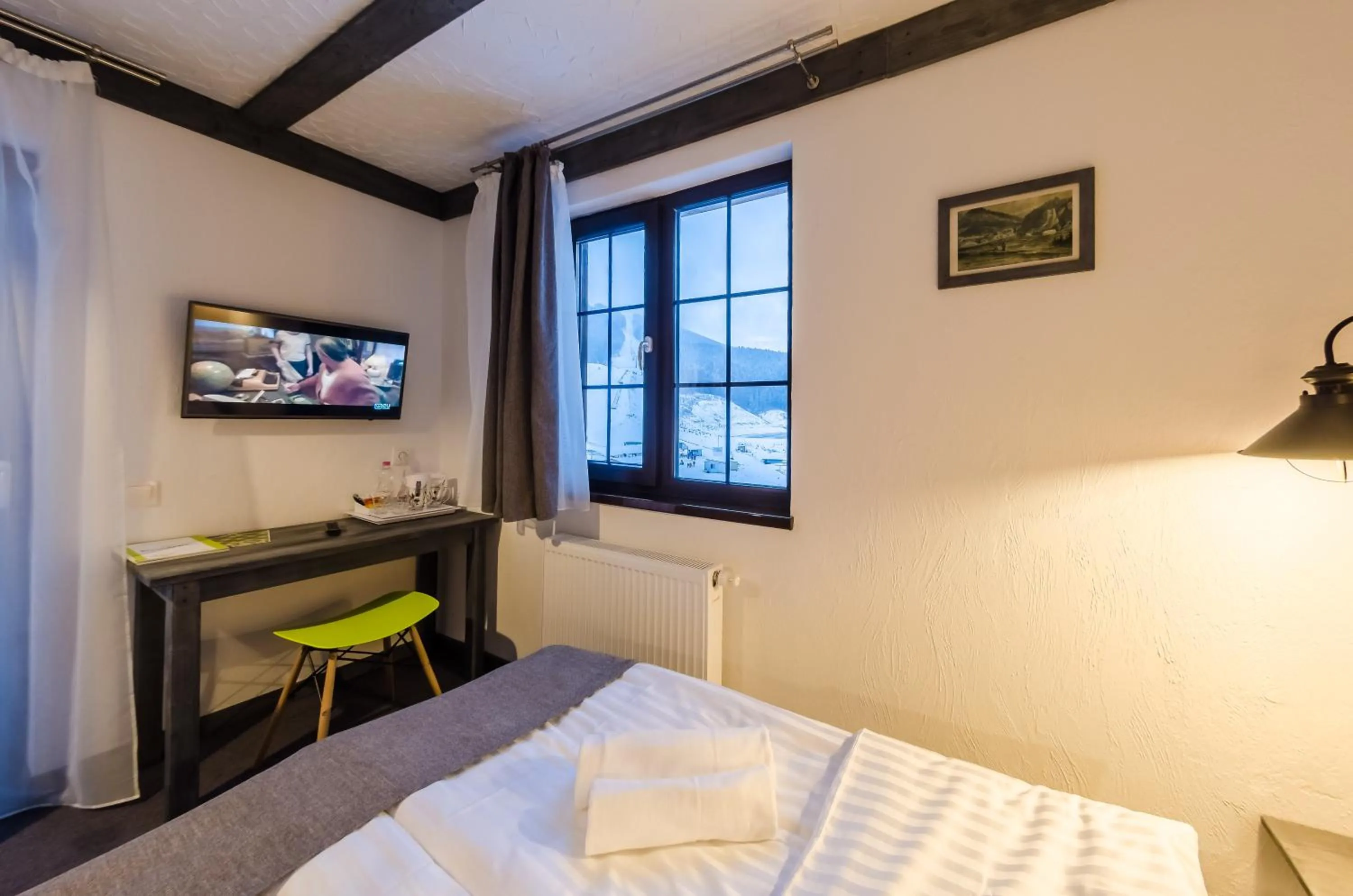 Photo of the whole room, Bed in Chalet CrepDeChine Hotel