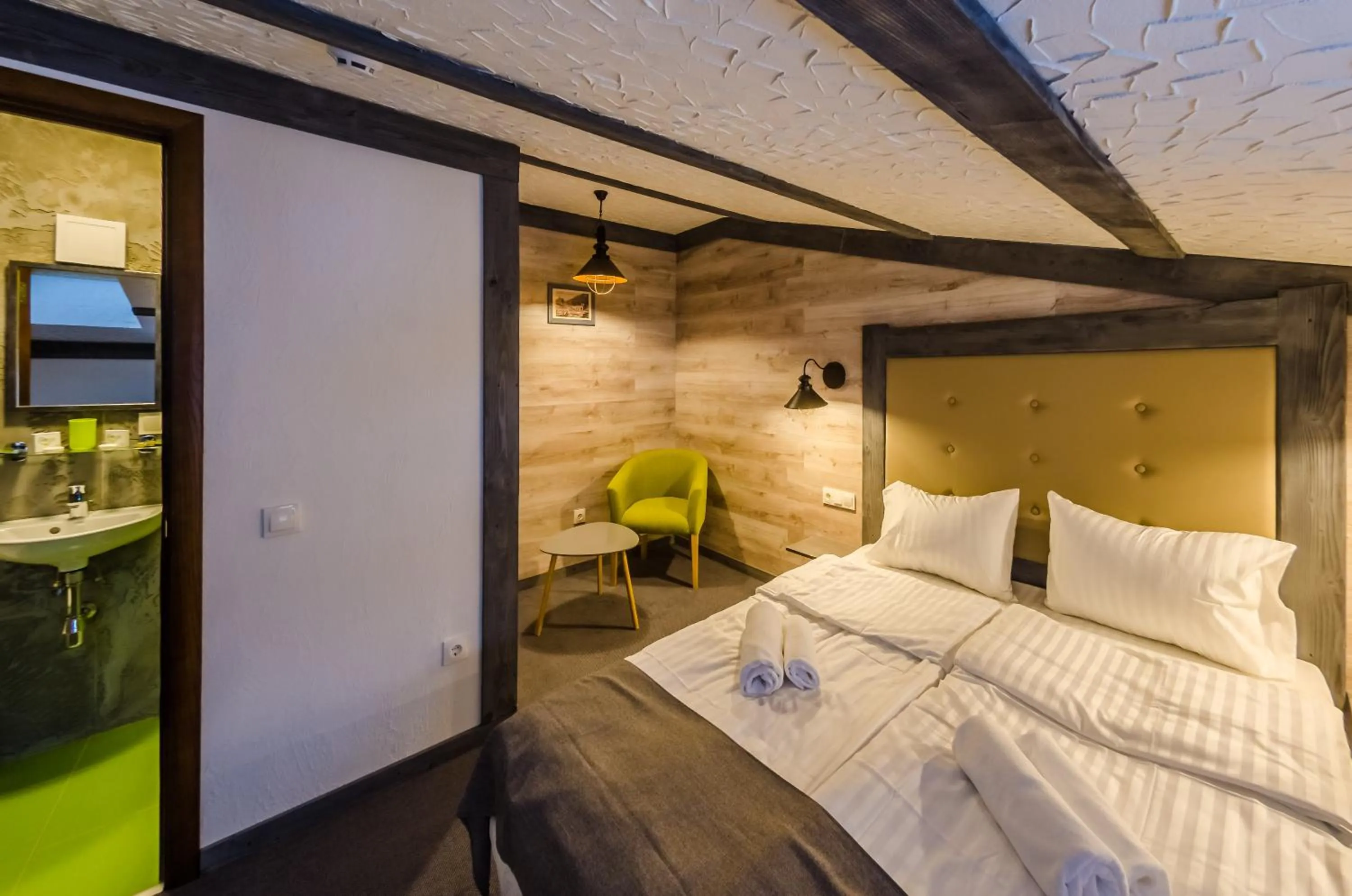 Photo of the whole room, Bed in Chalet CrepDeChine Hotel