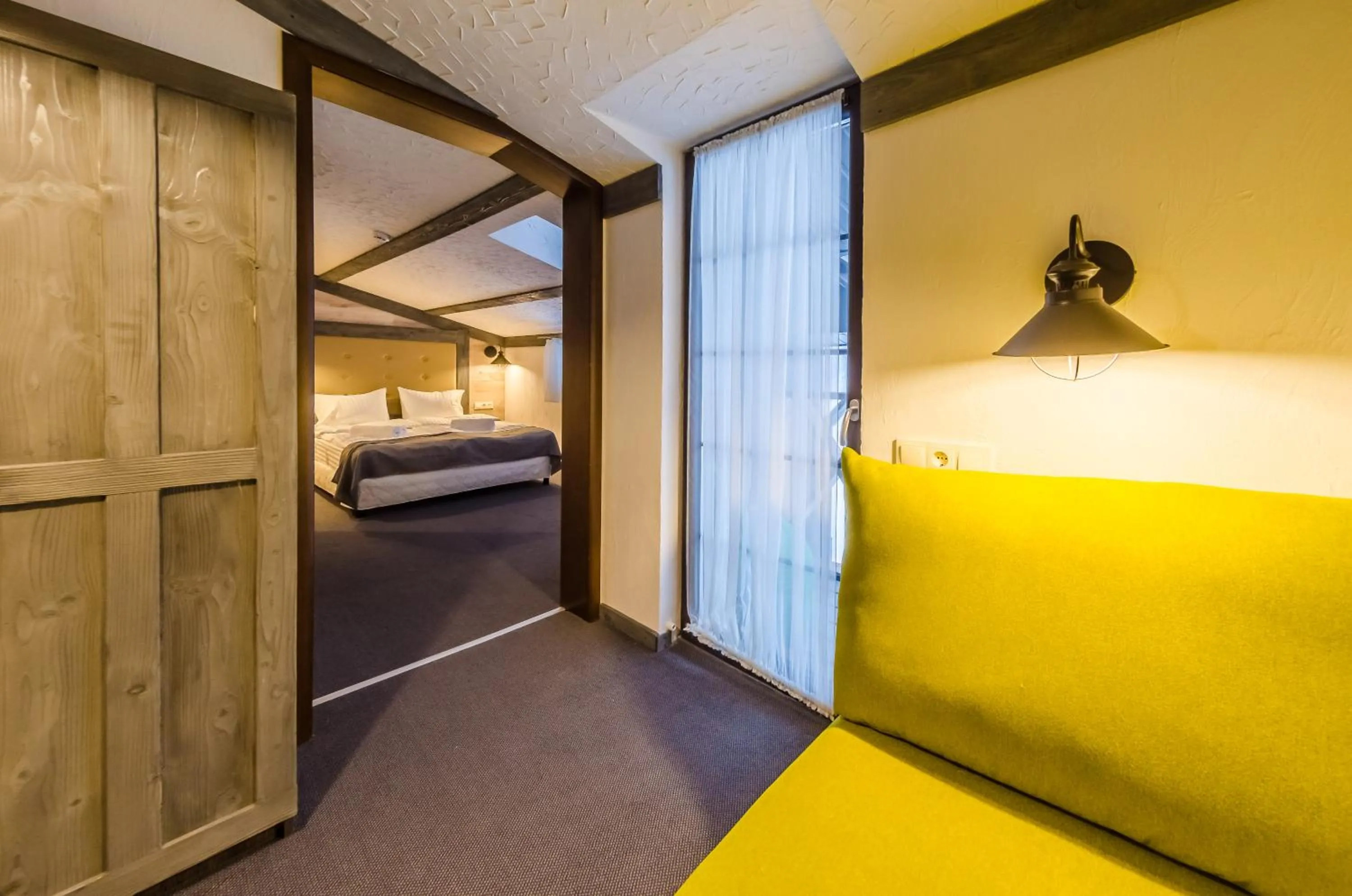 Photo of the whole room, Bed in Chalet CrepDeChine Hotel