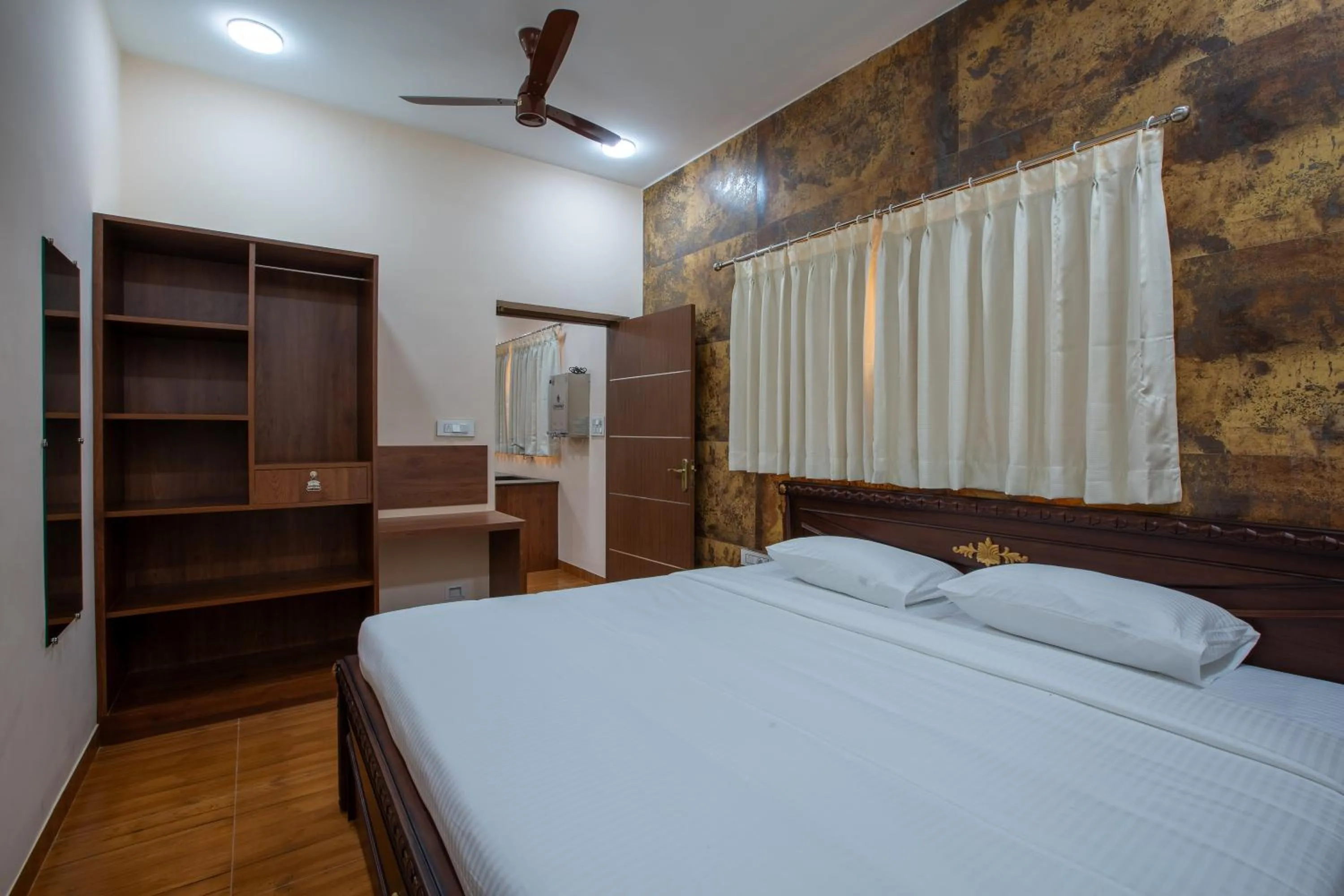 Photo of the whole room, Bed in MUGUNDAN 'S SMART STAY