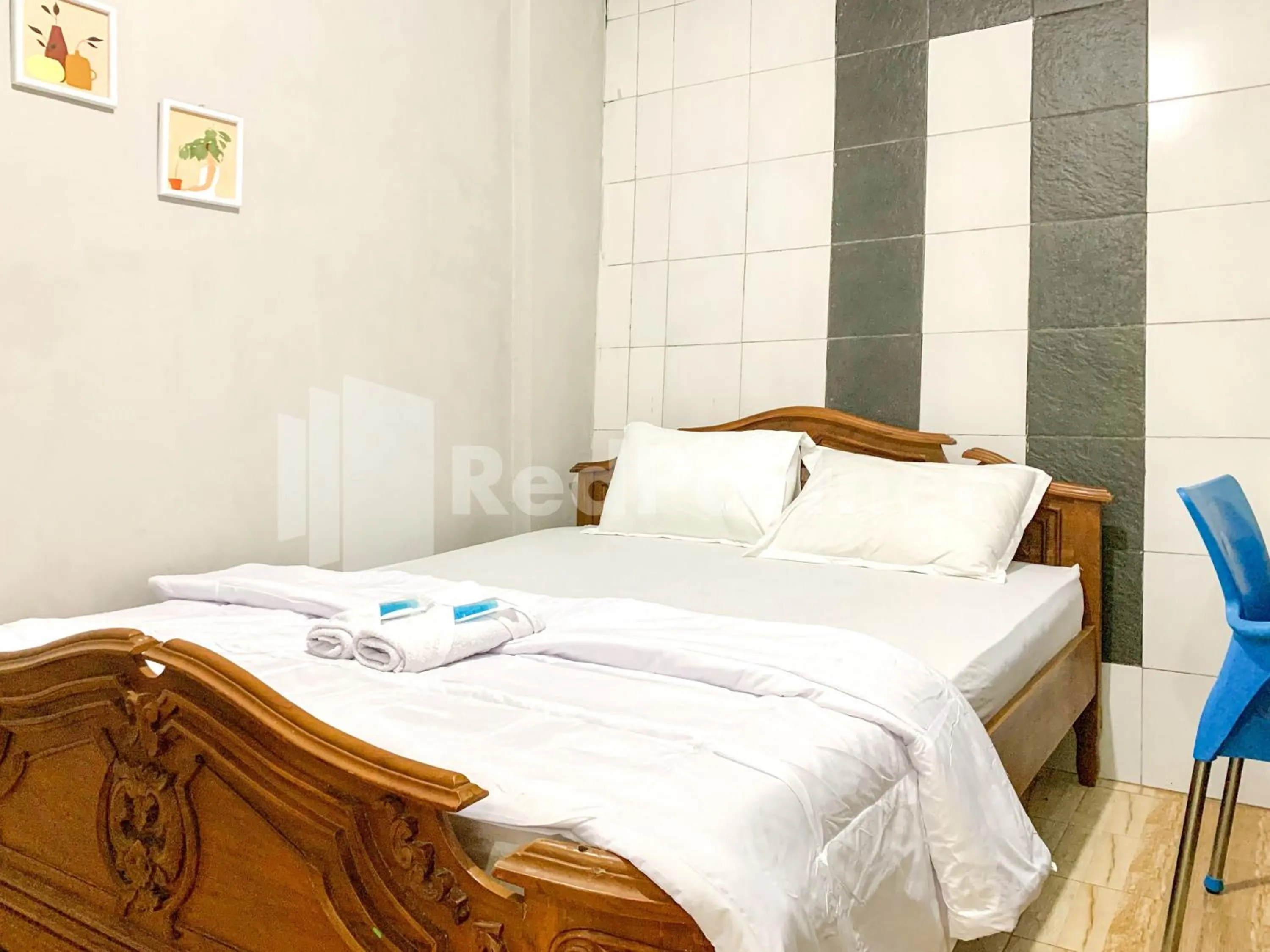 Bedroom, Bed in RedDoorz Syariah at De KostMarto UTY