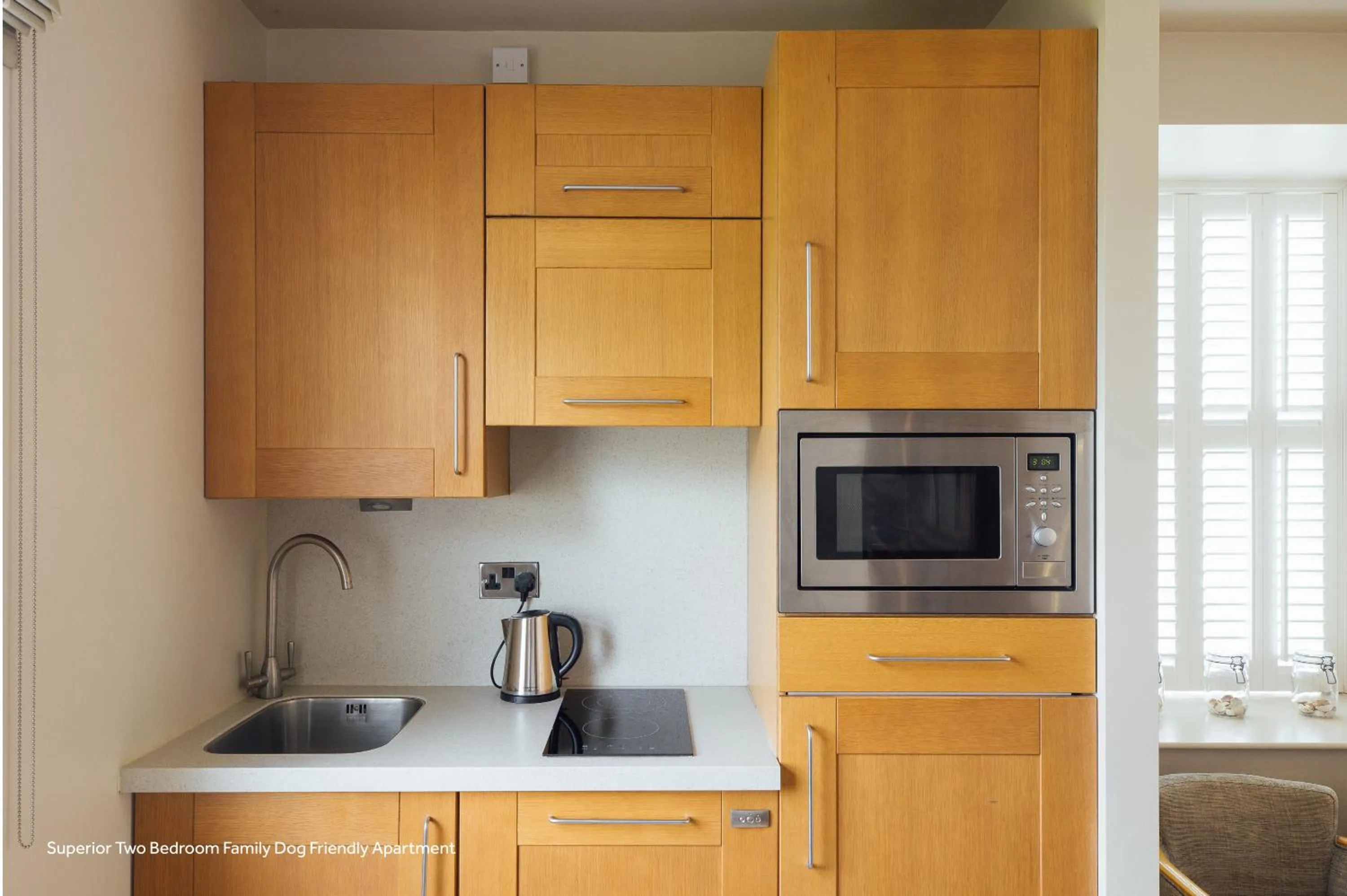 stove in St Brides Spa Hotel & Village Apartments