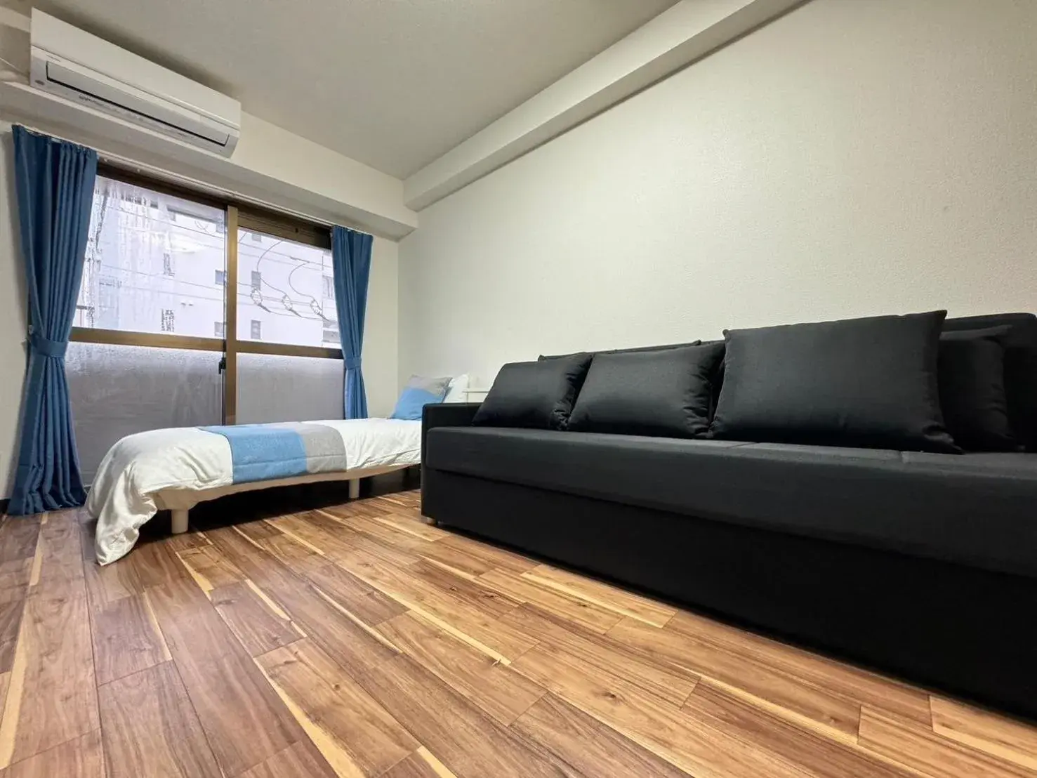 Bed in Sakura Sands Hotel Shinsaibashi Bed in Sakura Sands Hotel Shinsaibashi