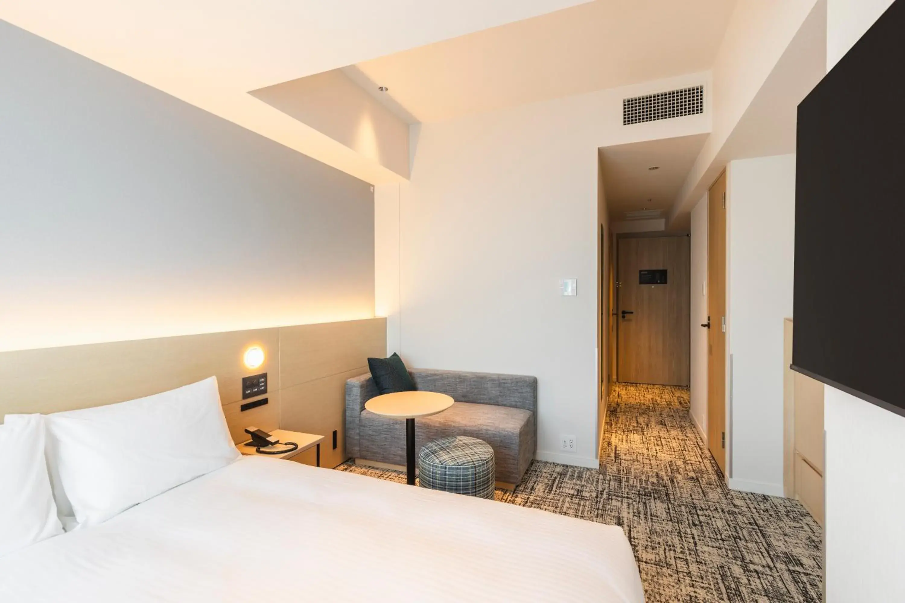 Bed in Sotetsu Hotels The Splaisir Yokohama Bed in Sotetsu Hotels The Splaisir Yokohama