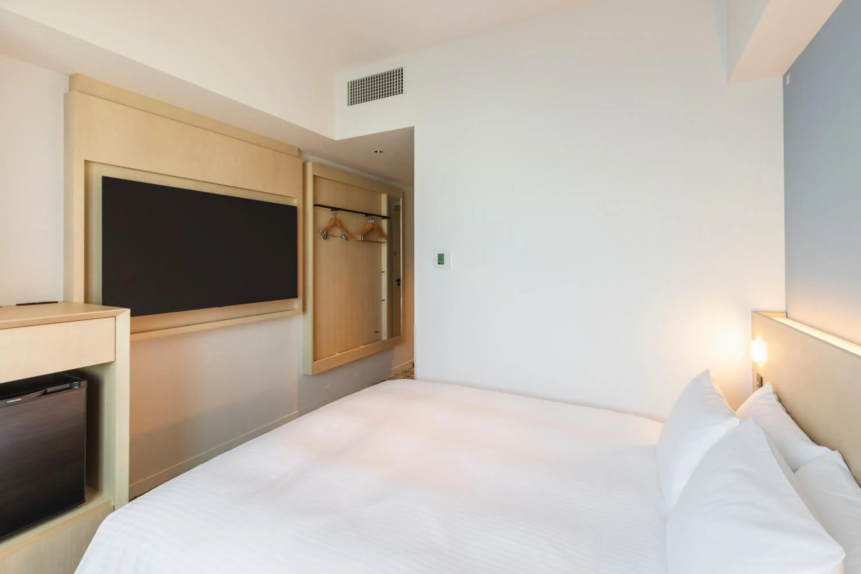 Bed in Sotetsu Hotels The Splaisir Yokohama Bed in Sotetsu Hotels The Splaisir Yokohama