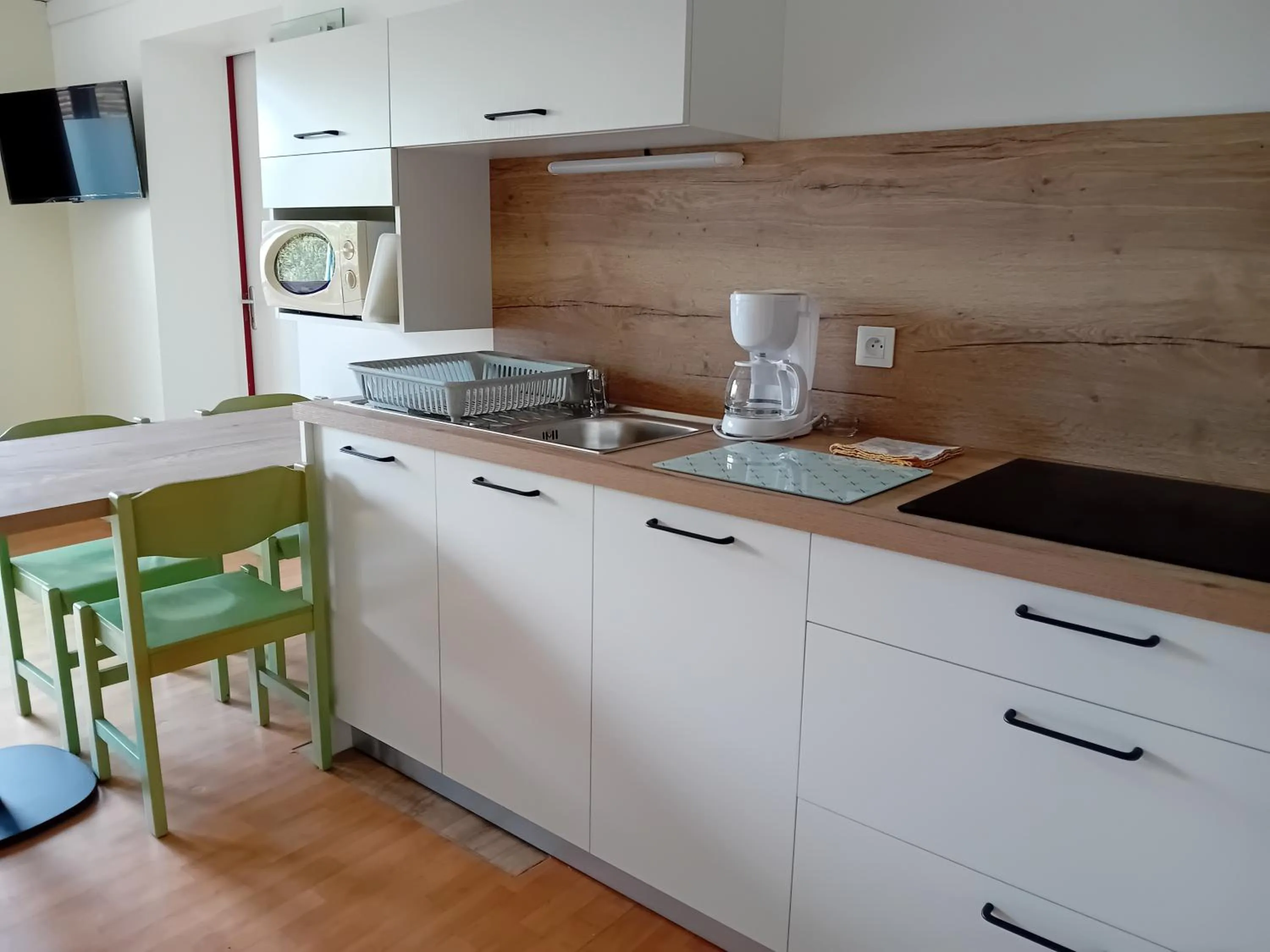 Kitchen or kitchenette in Olydea Vorey-sur-Arzon