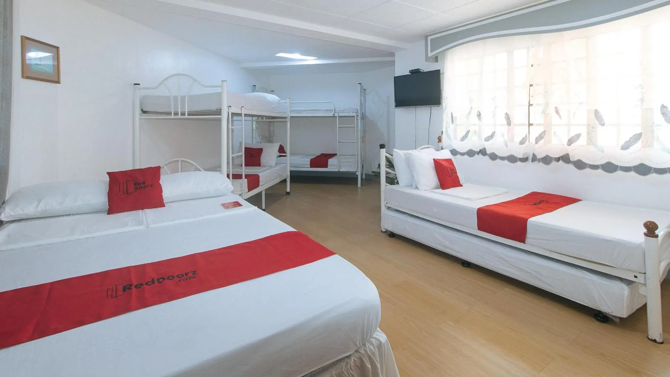 Bed in 8 Bed Mixed Dormitory in RedDoorz at Yahweh Spring Retreat and Resort Laguna Bed in 8 Bed Mixed Dormitory in RedDoorz at Yahweh Spring Retreat and Resort Laguna