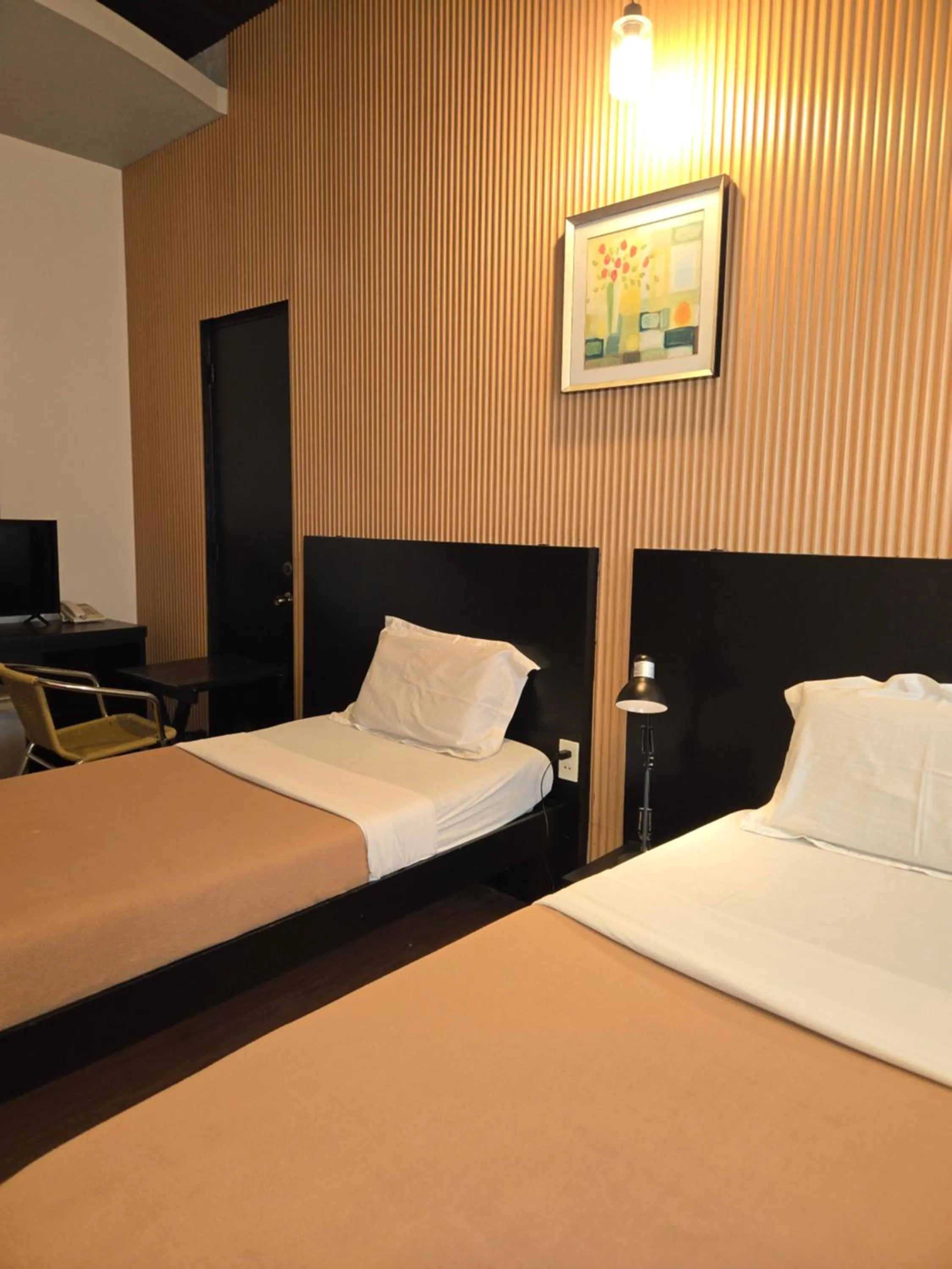 Bedroom, Bed in First Pacific Inn Davao