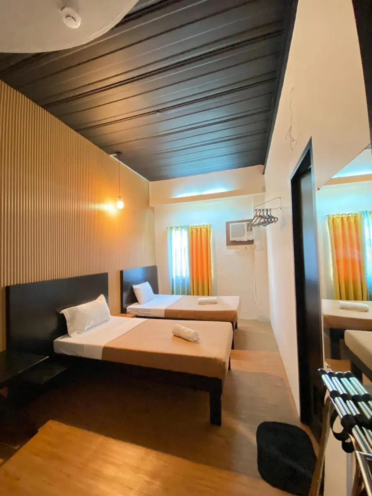 Bed in First Pacific Inn Davao Bed in First Pacific Inn Davao