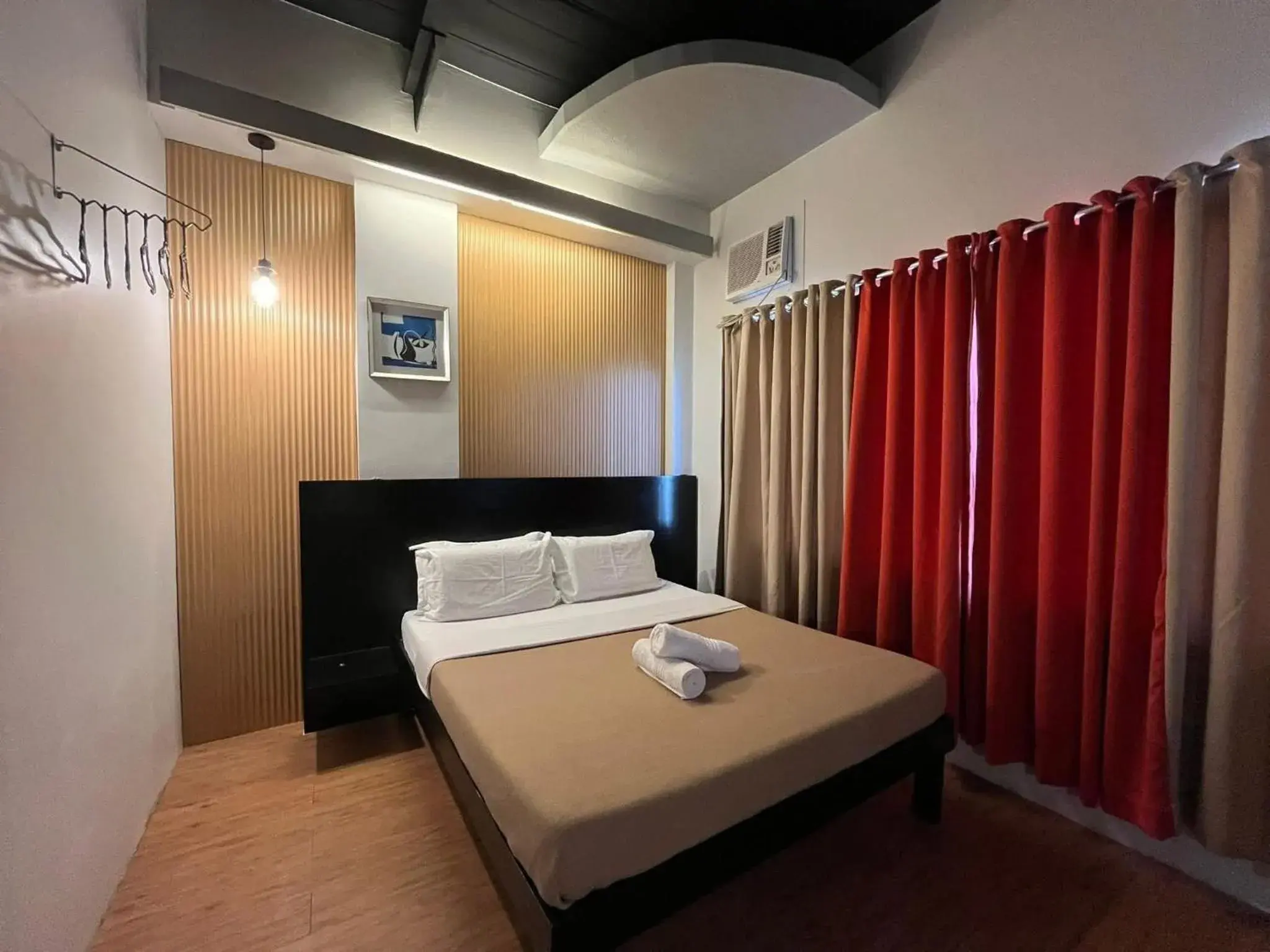 Bed in First Pacific Inn Davao Bed in First Pacific Inn Davao