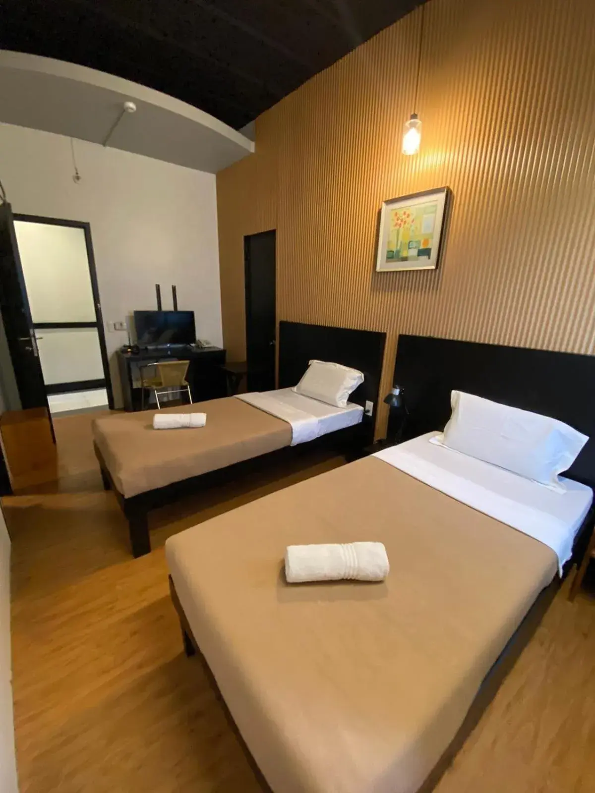 Bed in First Pacific Inn Davao Bed in First Pacific Inn Davao