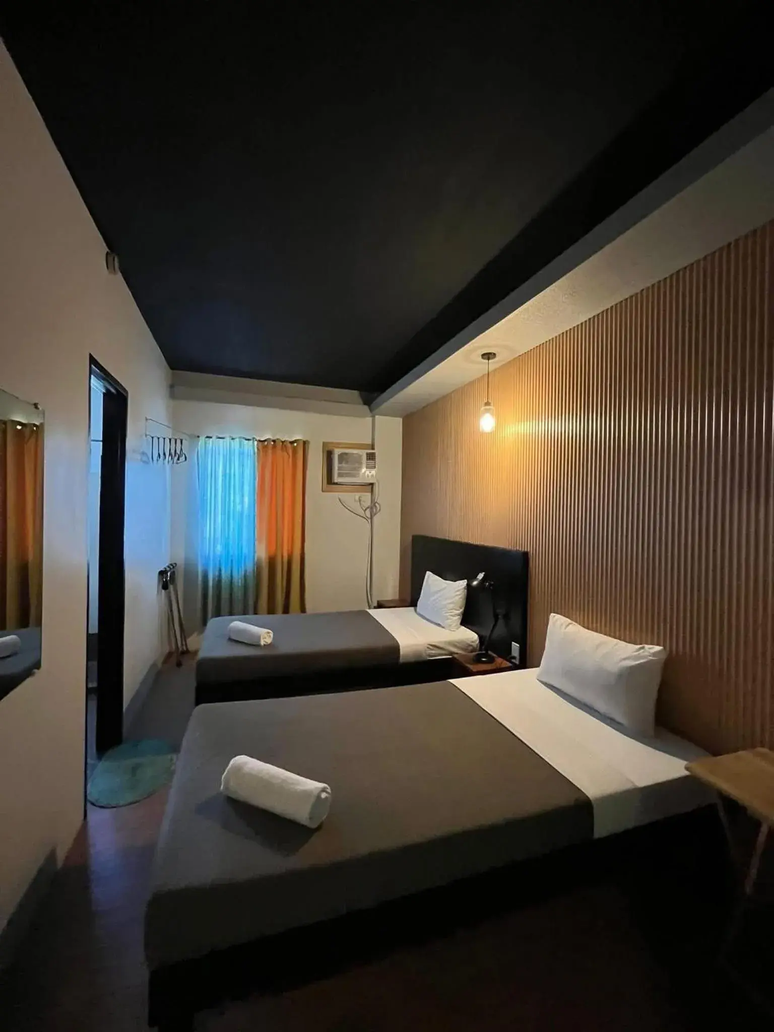 Bed in First Pacific Inn Davao Bed in First Pacific Inn Davao