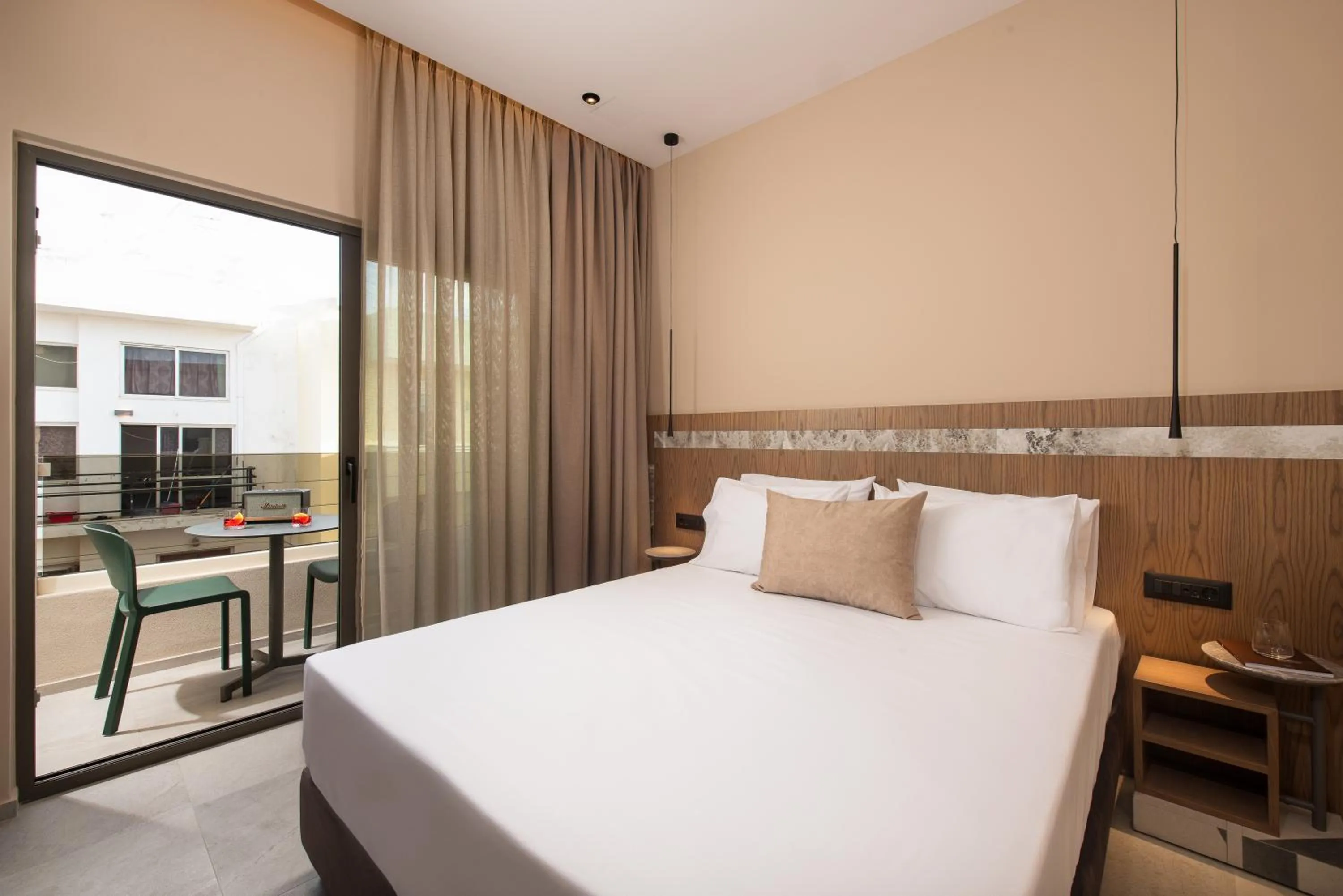 Bed in Cosmeen Lifestyle Boutique Stay