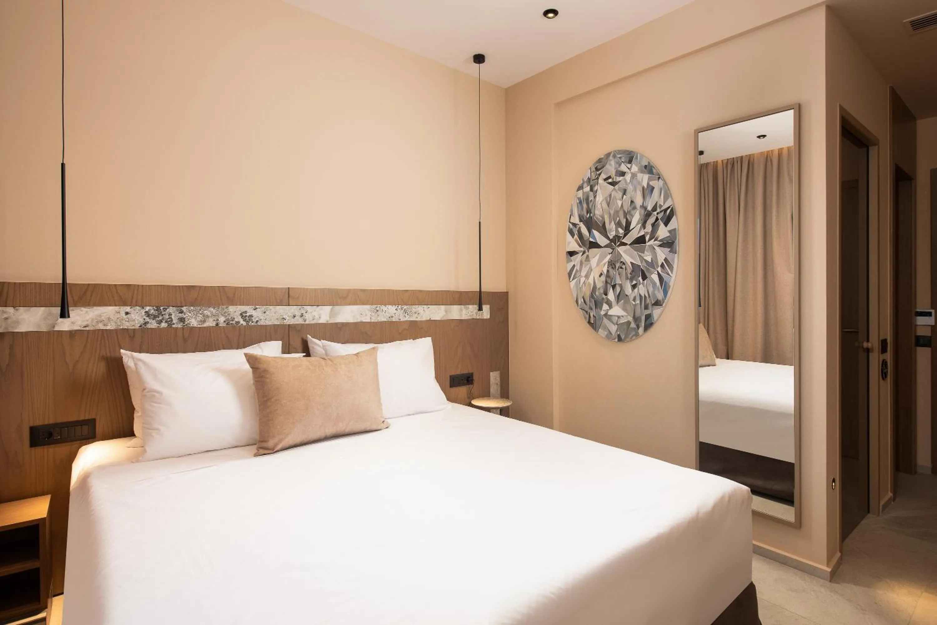 Bed in Cosmeen Lifestyle Boutique Stay