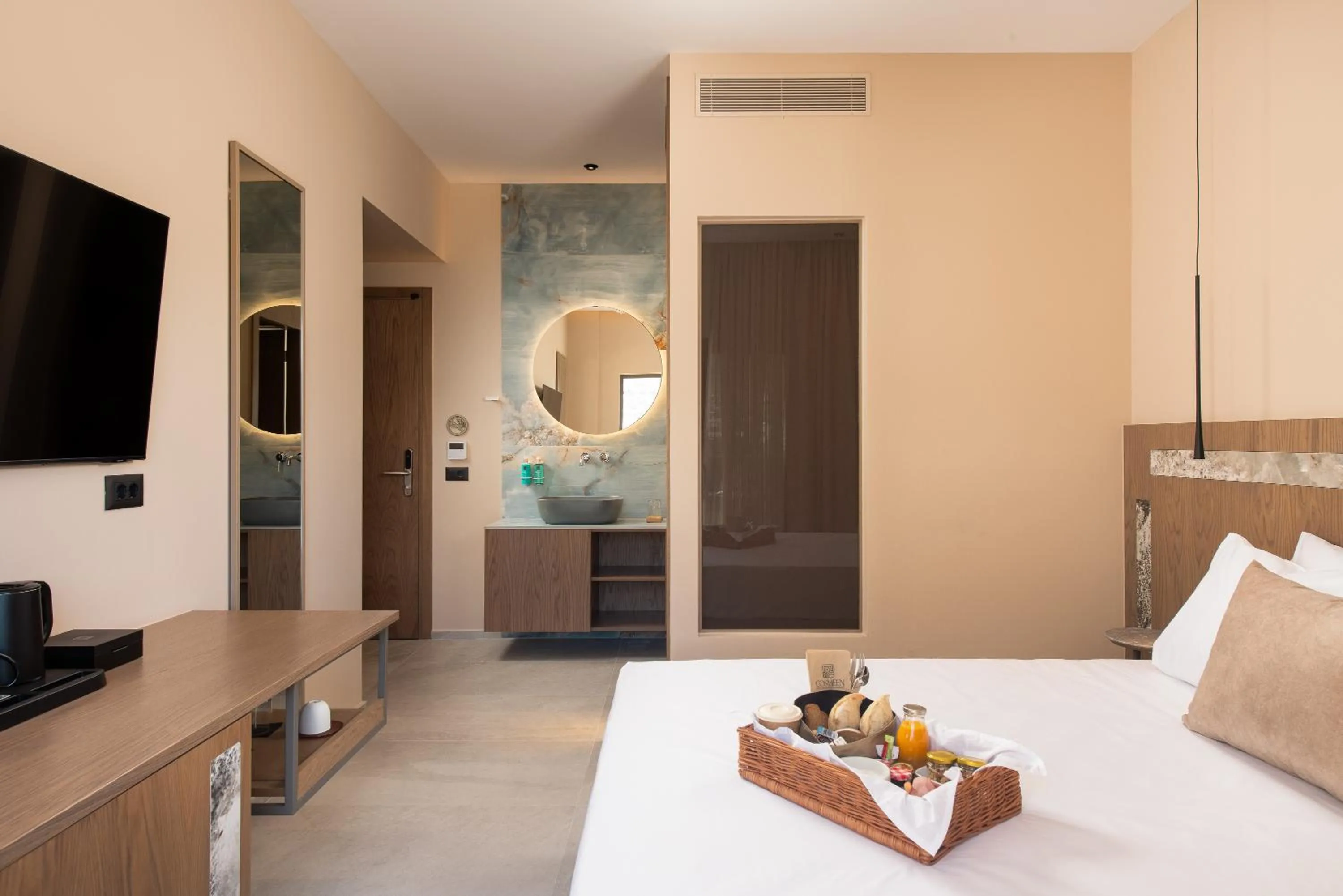 Bed in Cosmeen Lifestyle Boutique Stay