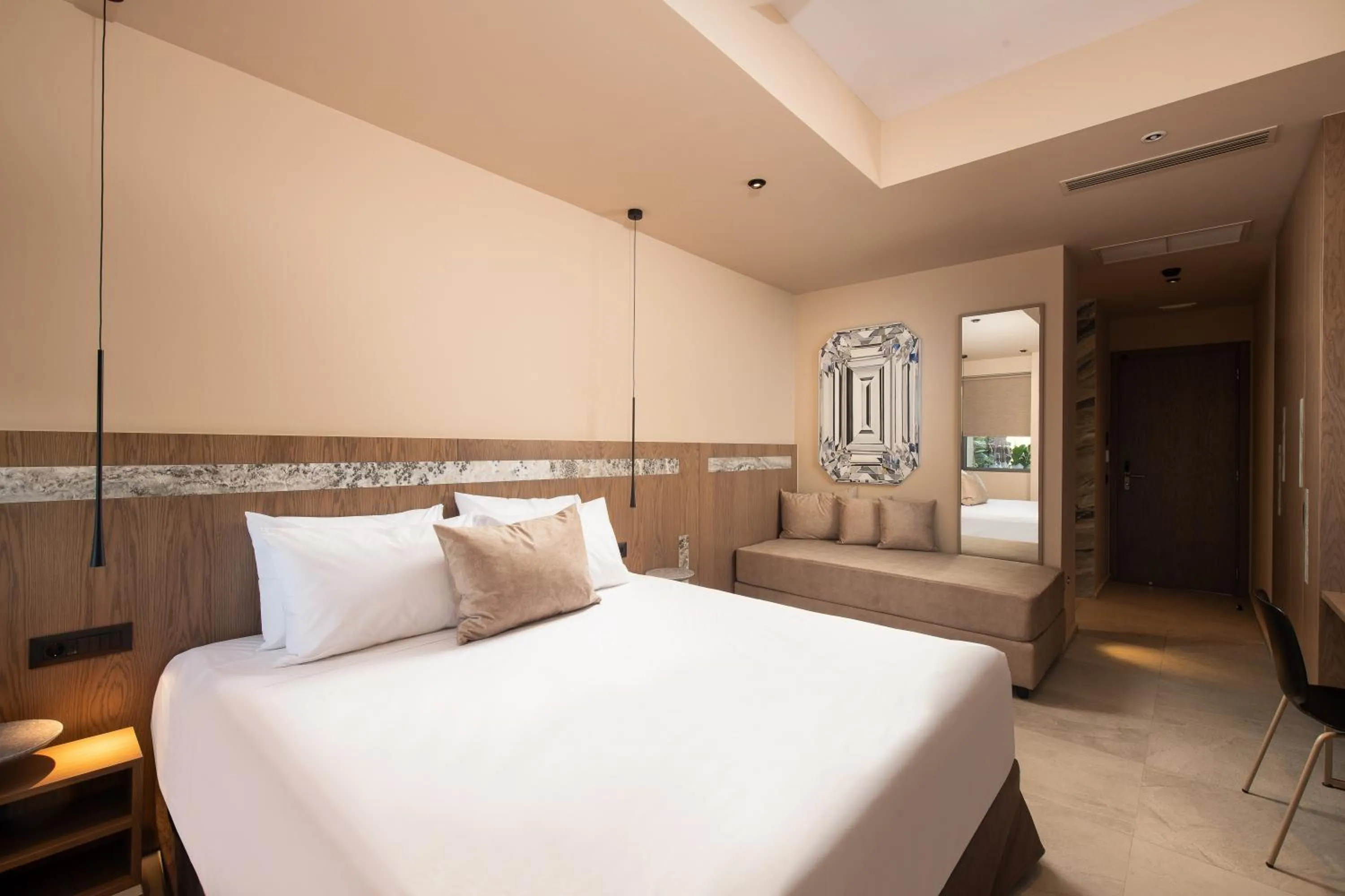 Bed in Cosmeen Lifestyle Boutique Stay