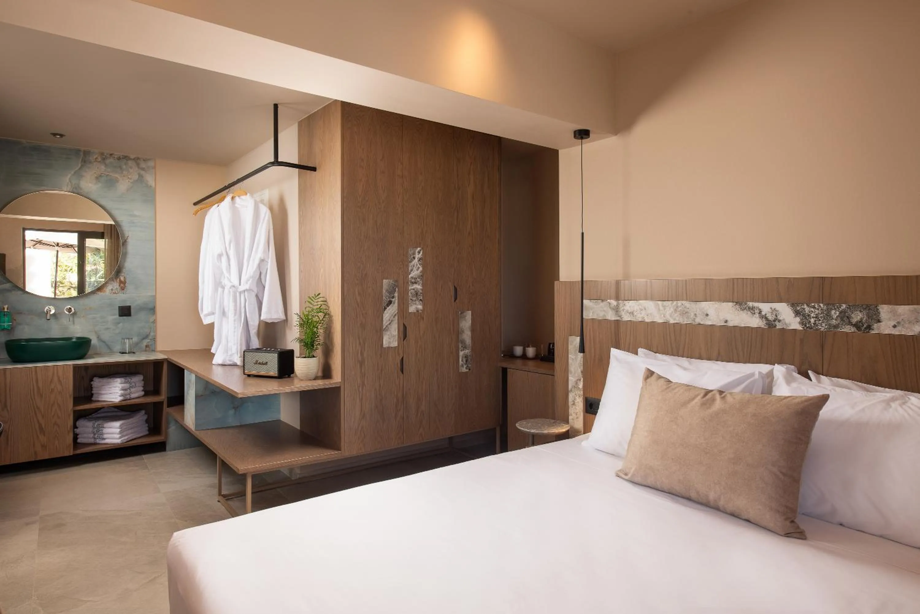 Bed in Cosmeen Lifestyle Boutique Stay