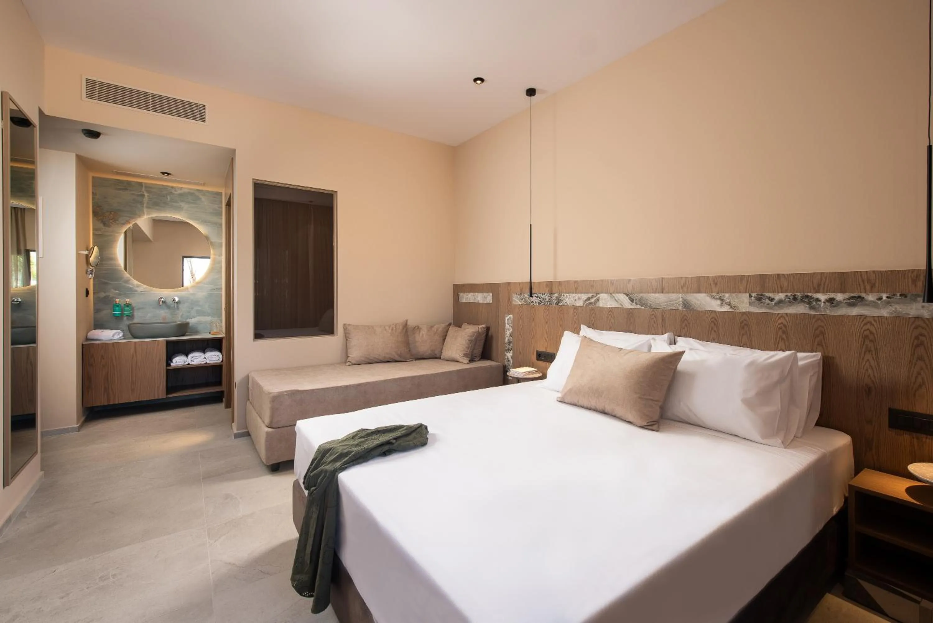 Bed in Cosmeen Lifestyle Boutique Stay