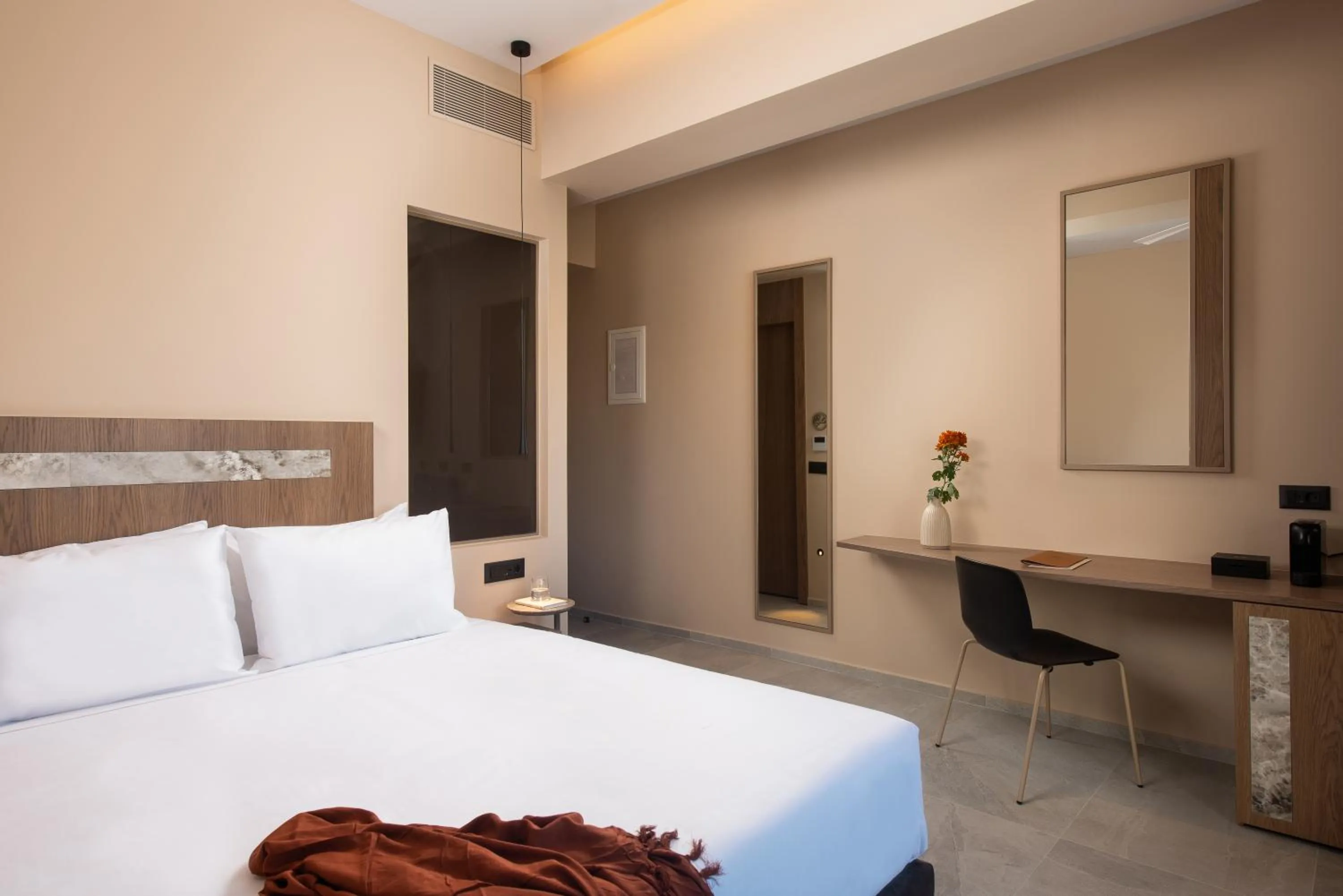 Bed in Cosmeen Lifestyle Boutique Stay