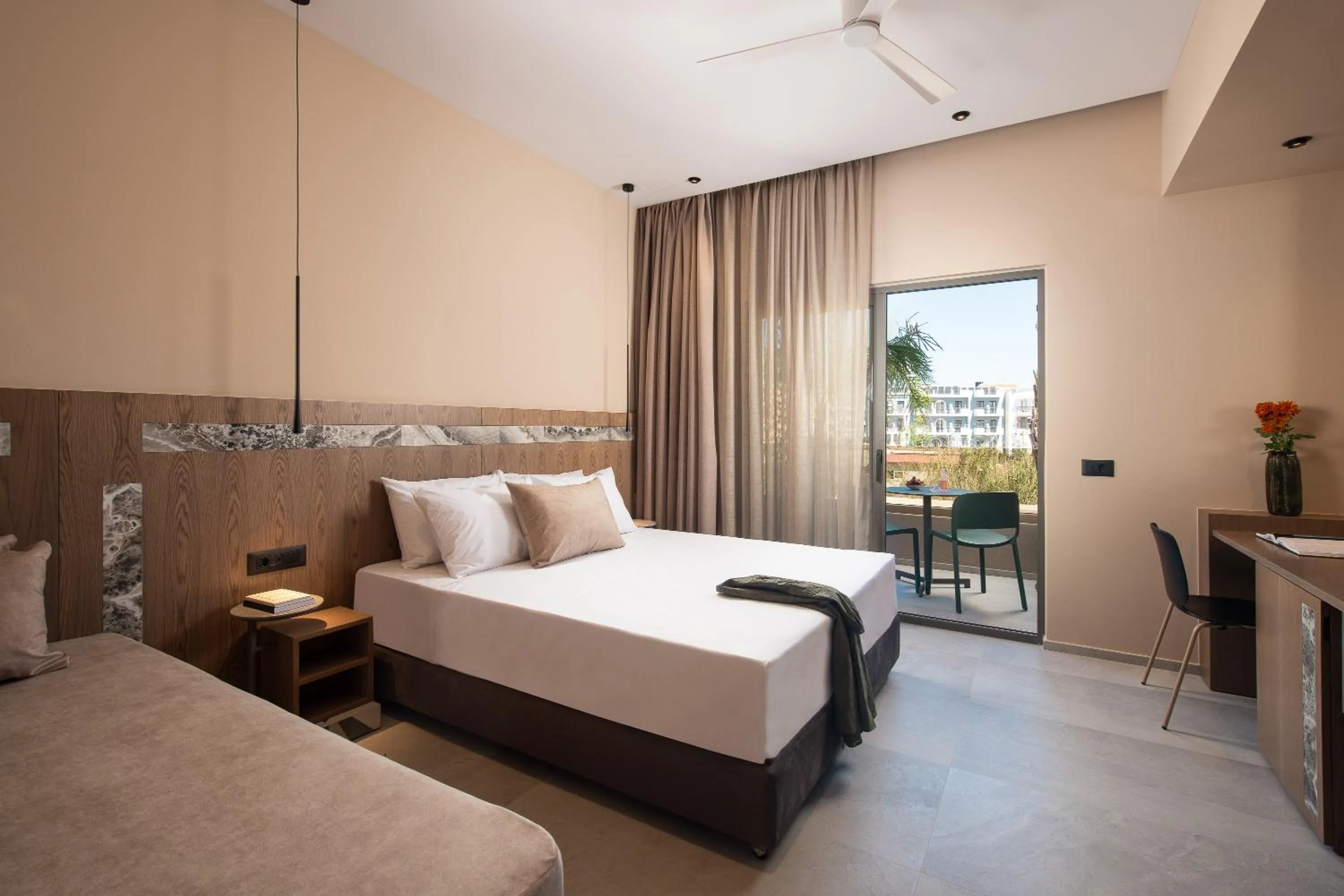 Bed in Cosmeen Lifestyle Boutique Stay