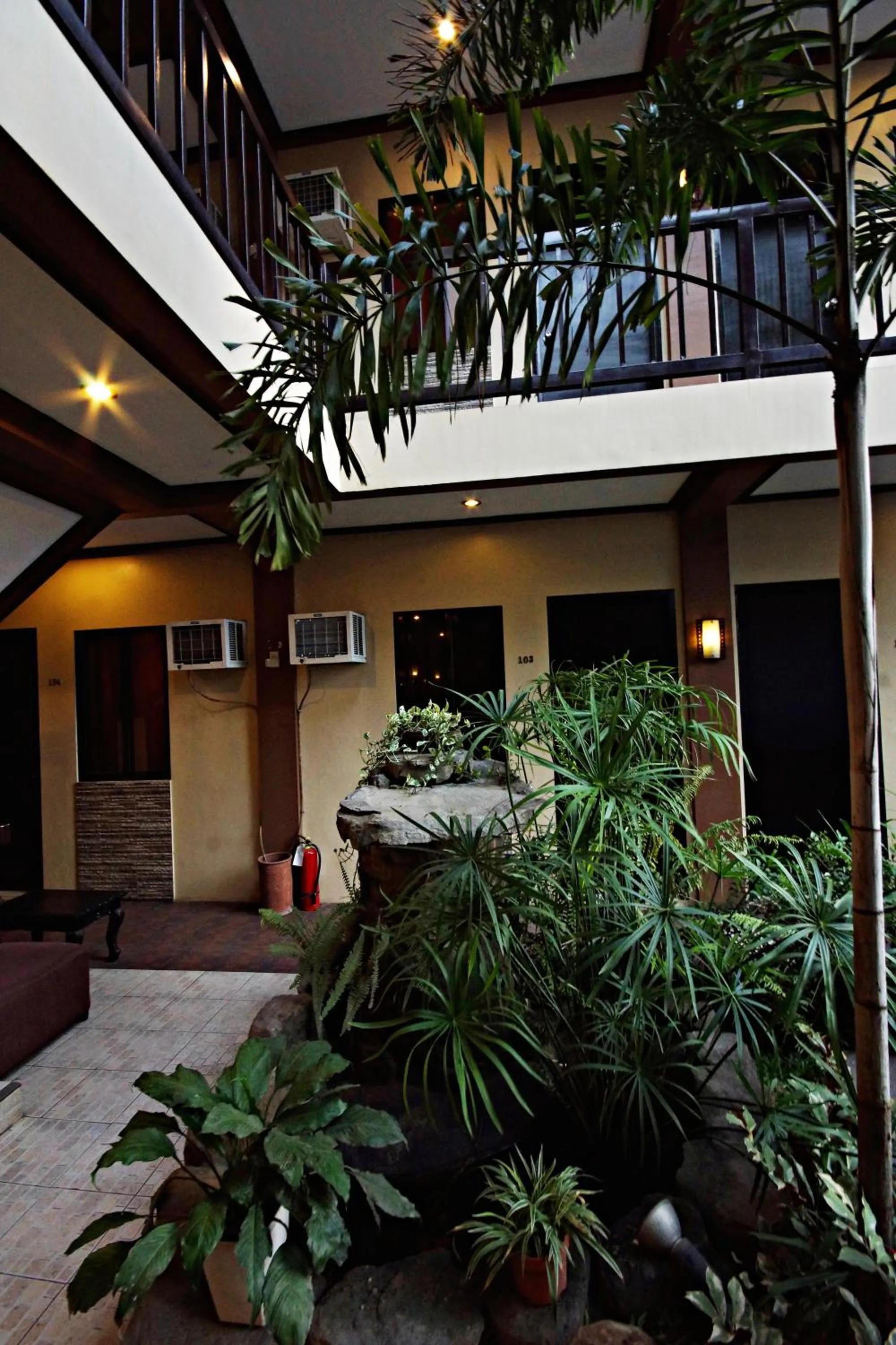 Facade/entrance in Pacific Palm Suites Davao powered by Cocotel