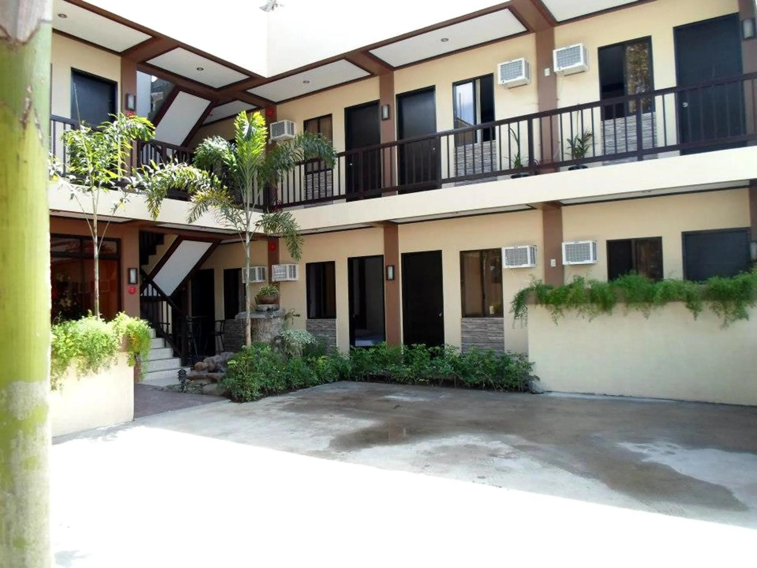 Property building in Pacific Palm Suites Davao powered by Cocotel