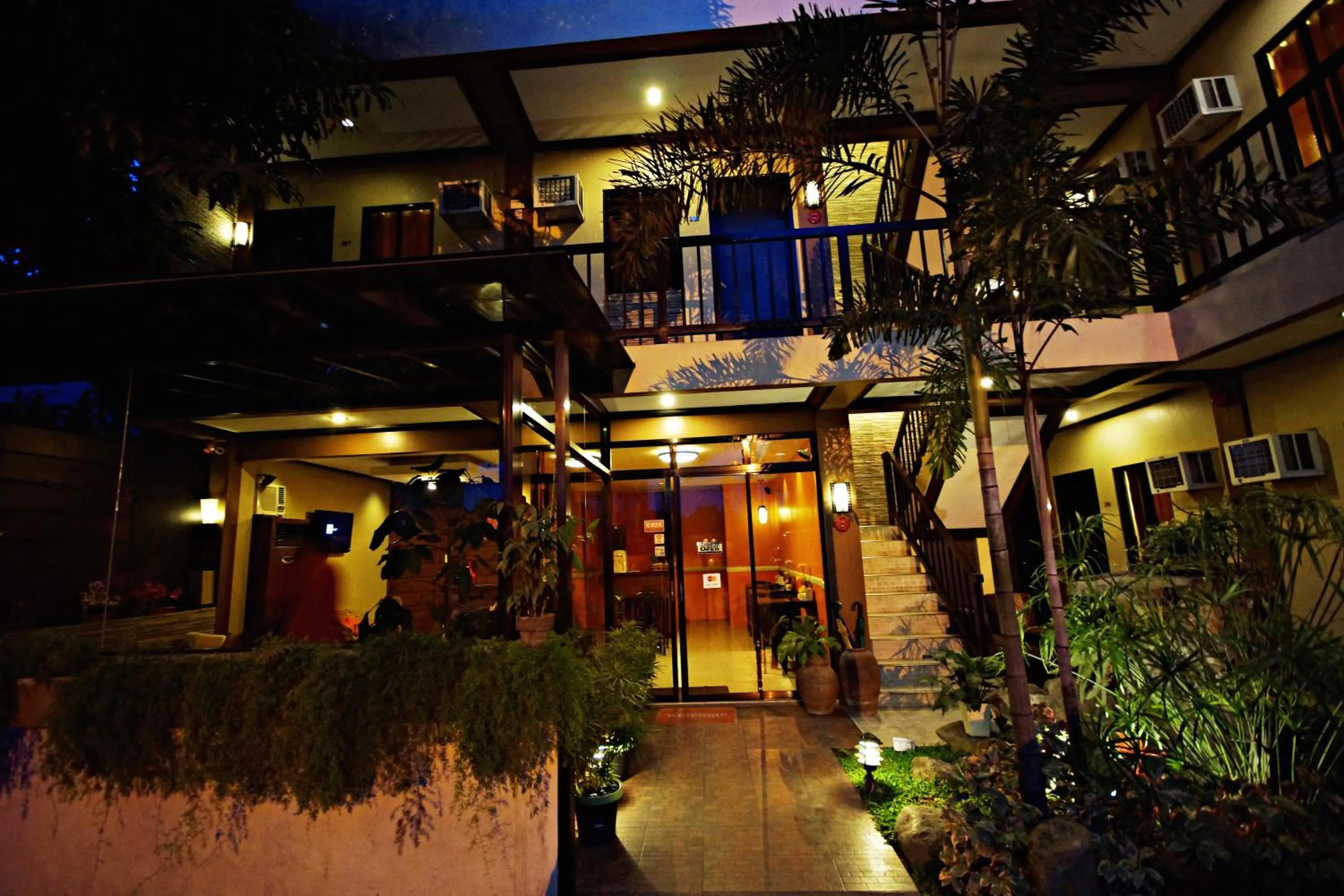 Facade/entrance in Pacific Palm Suites Davao powered by Cocotel
