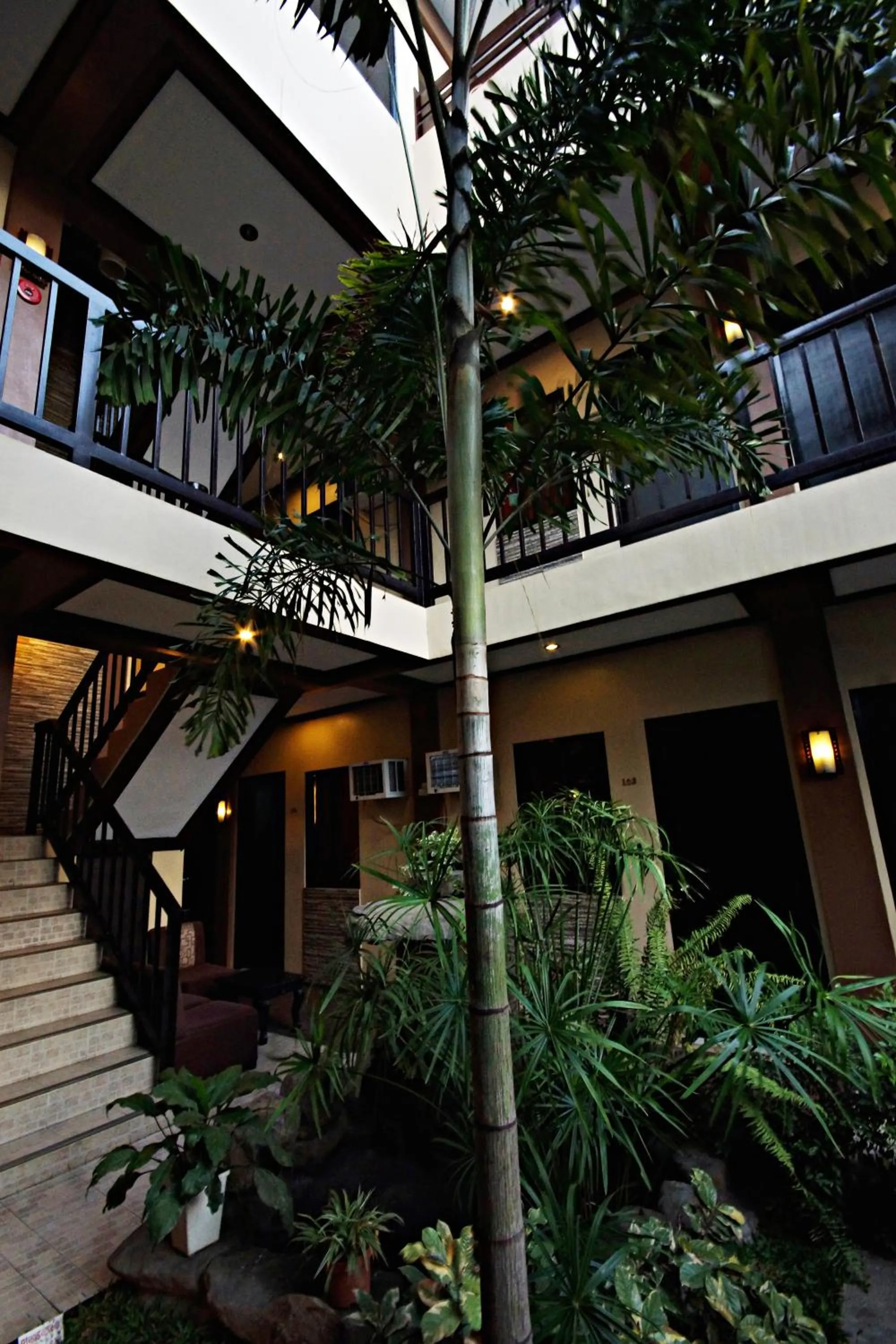 Facade/entrance in Pacific Palm Suites Davao powered by Cocotel