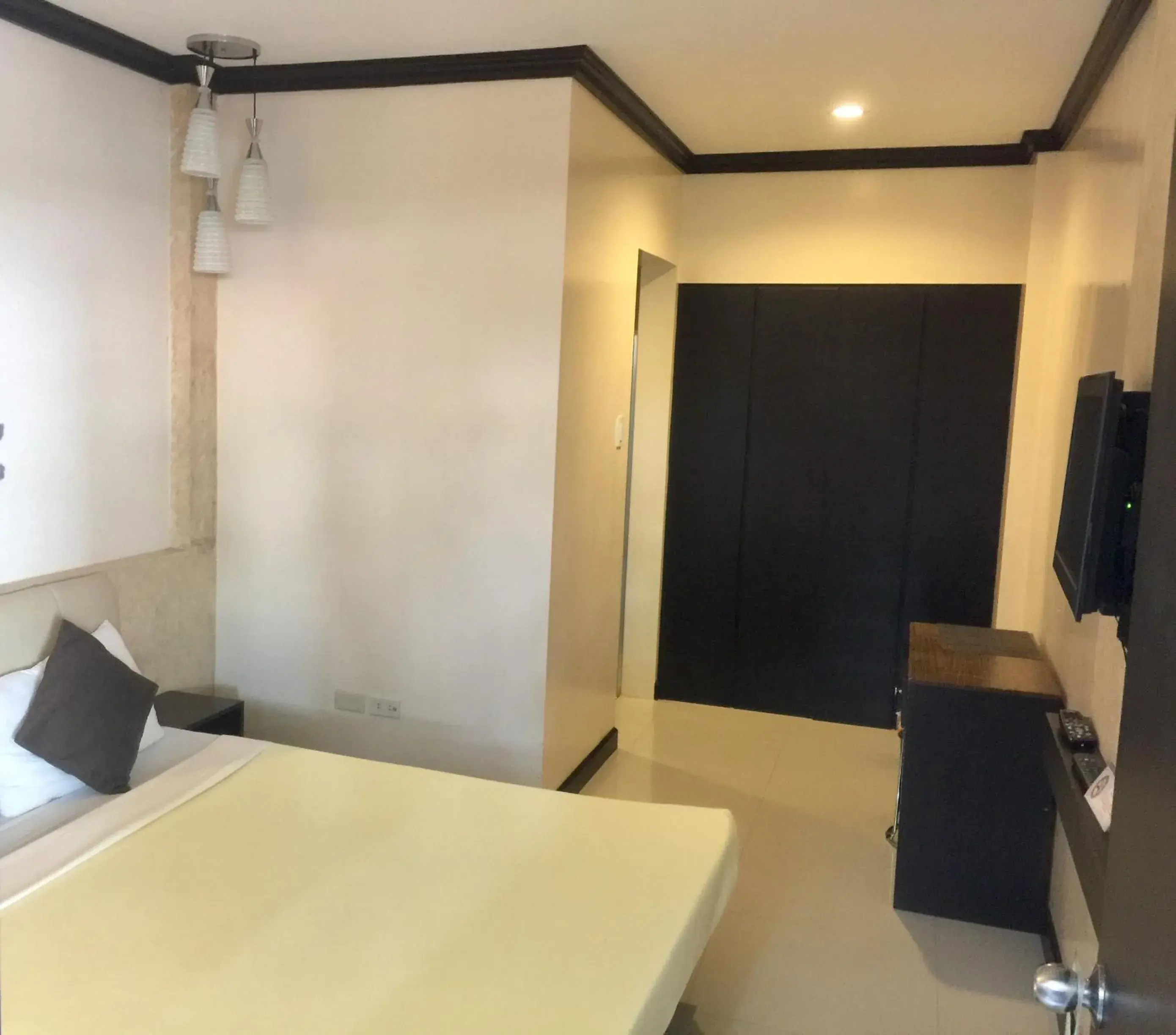 Deluxe Queen Room in Pacific Palm Suites Davao powered by Cocotel Deluxe Queen Room in Pacific Palm Suites Davao powered by Cocotel