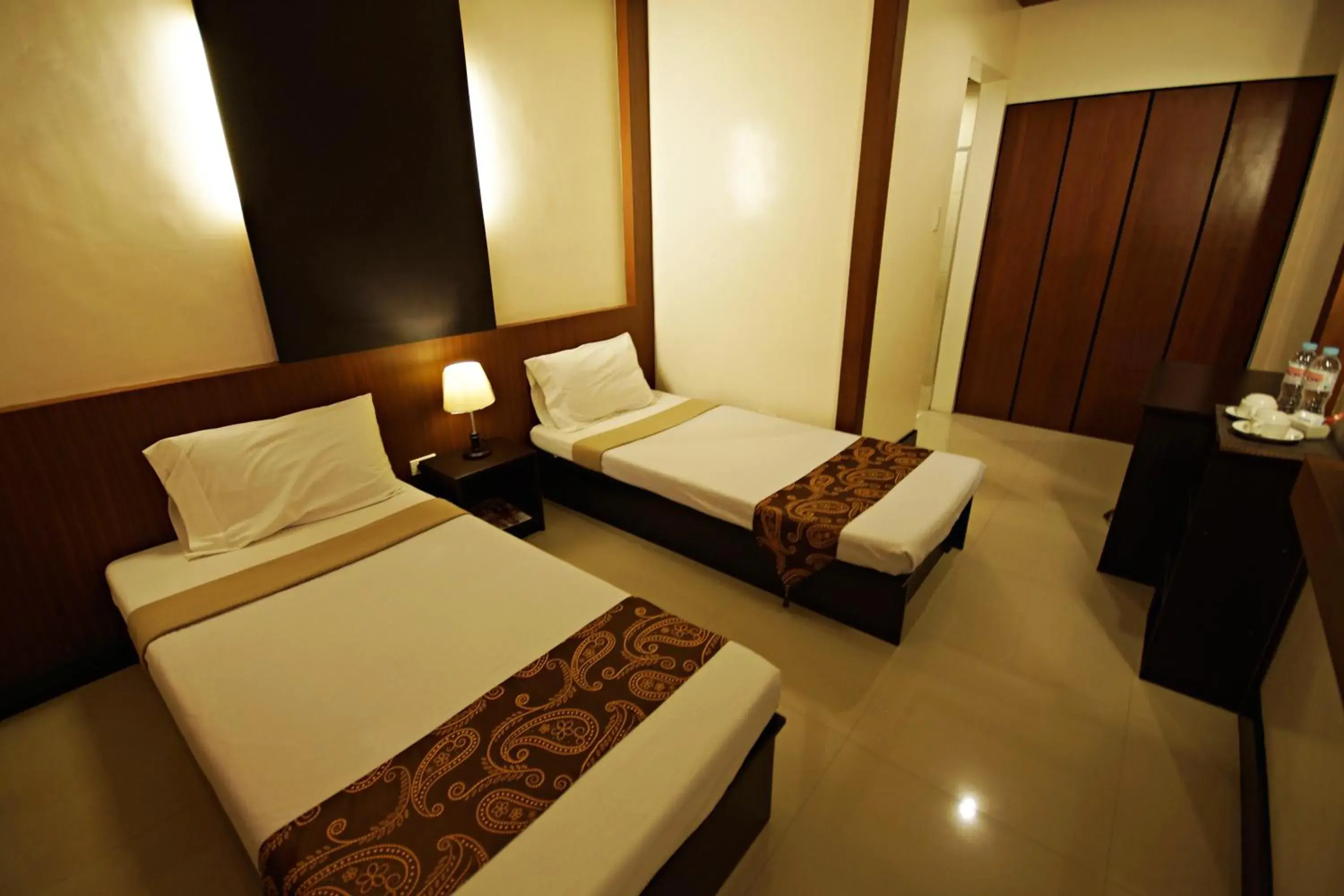 Deluxe Twin Room in Pacific Palm Suites Davao powered by Cocotel Deluxe Twin Room in Pacific Palm Suites Davao powered by Cocotel