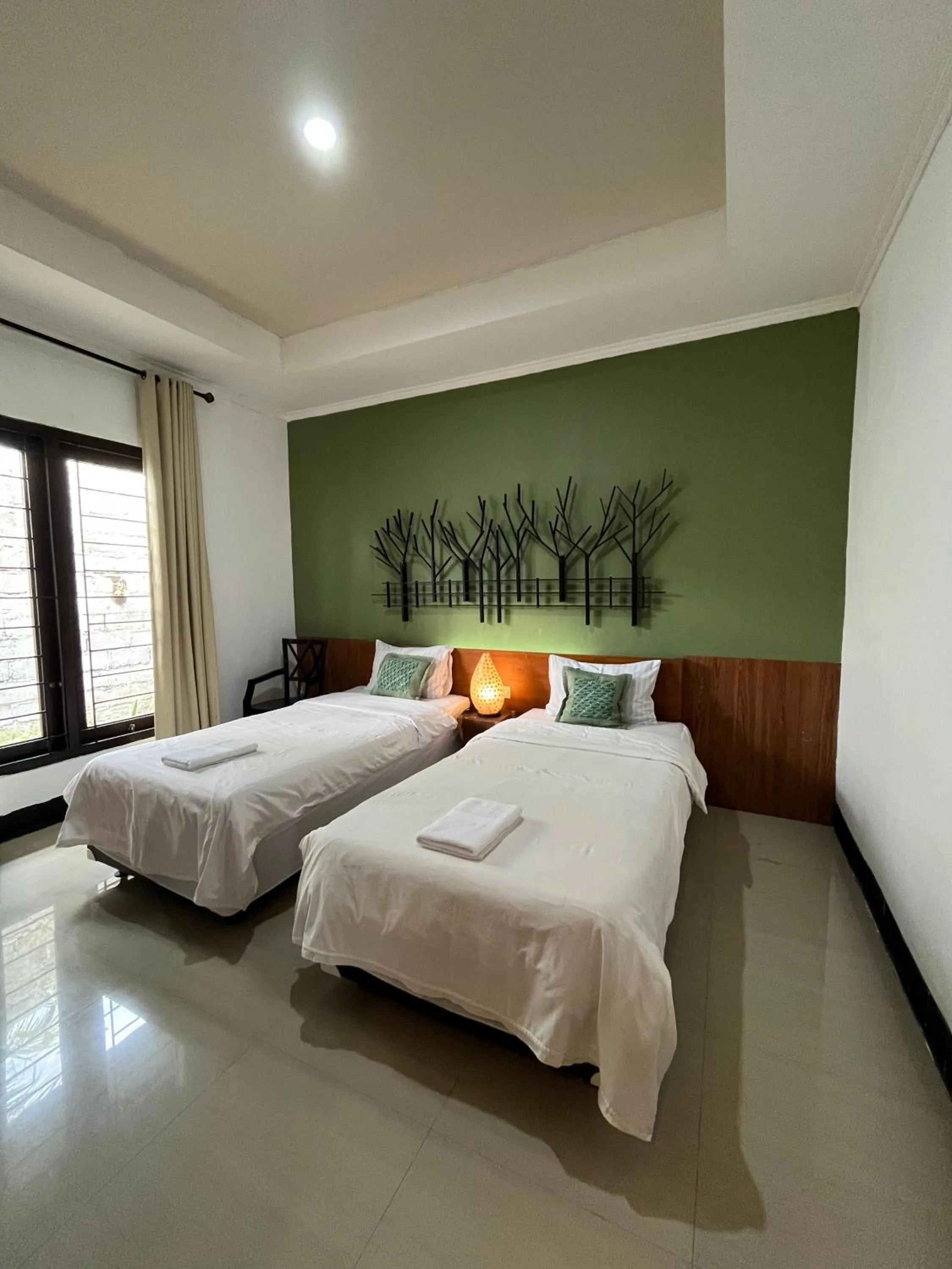 Bed in Villa Padi Cangkringan