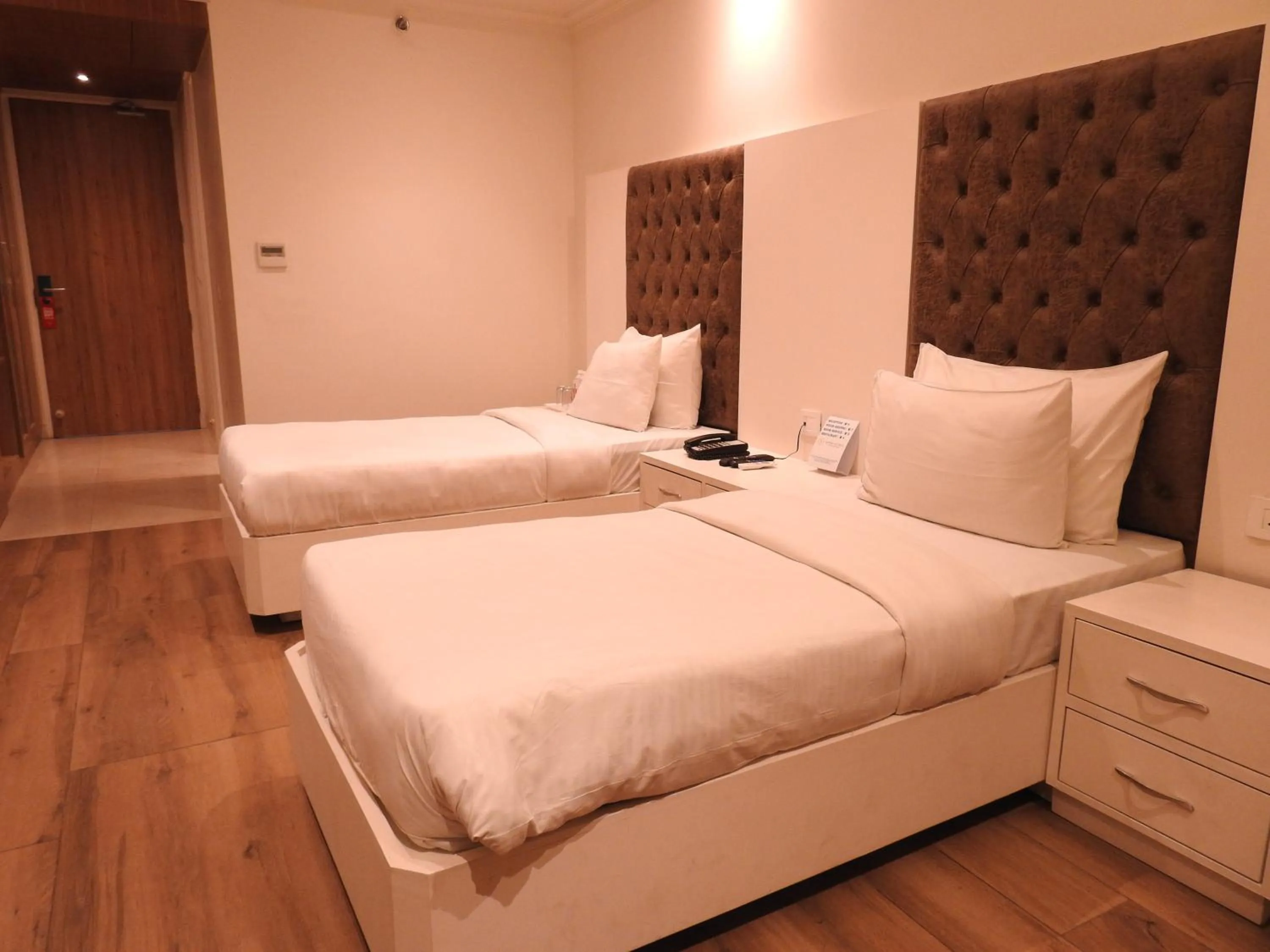 Bed in Sapphire Sky Hotel