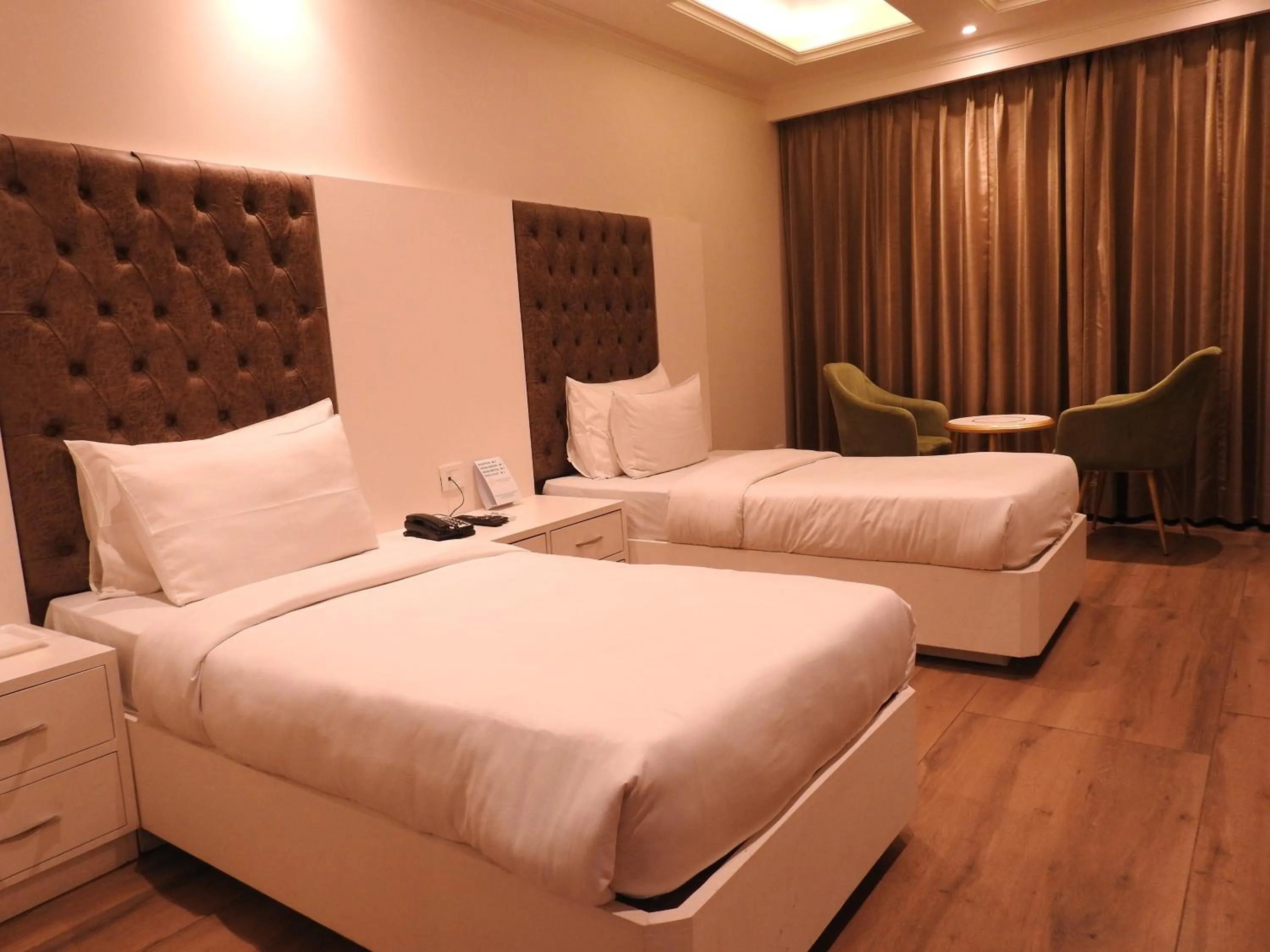 Bed in Sapphire Sky Hotel