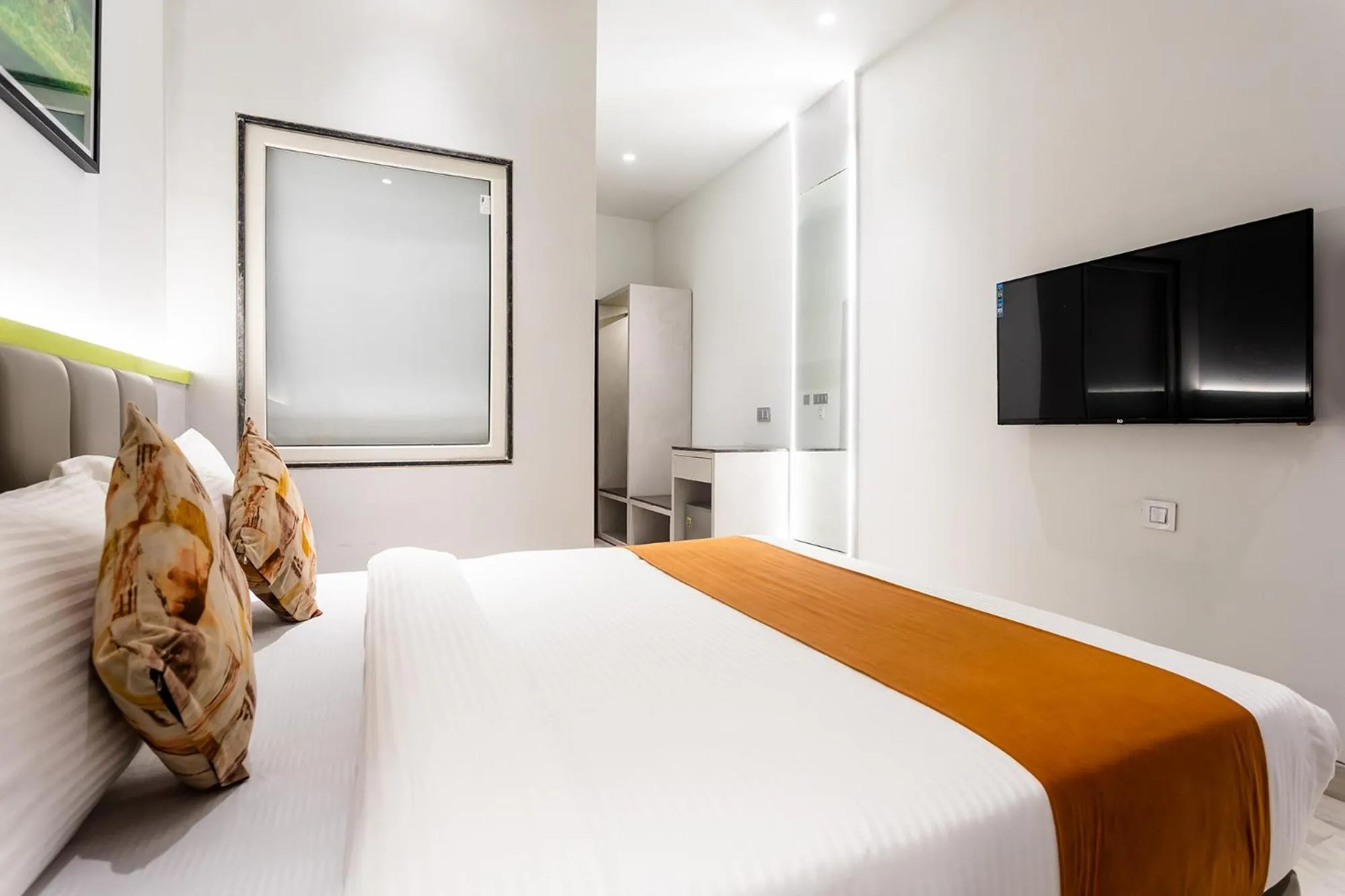 Bed in FabHotel Orange Oasis