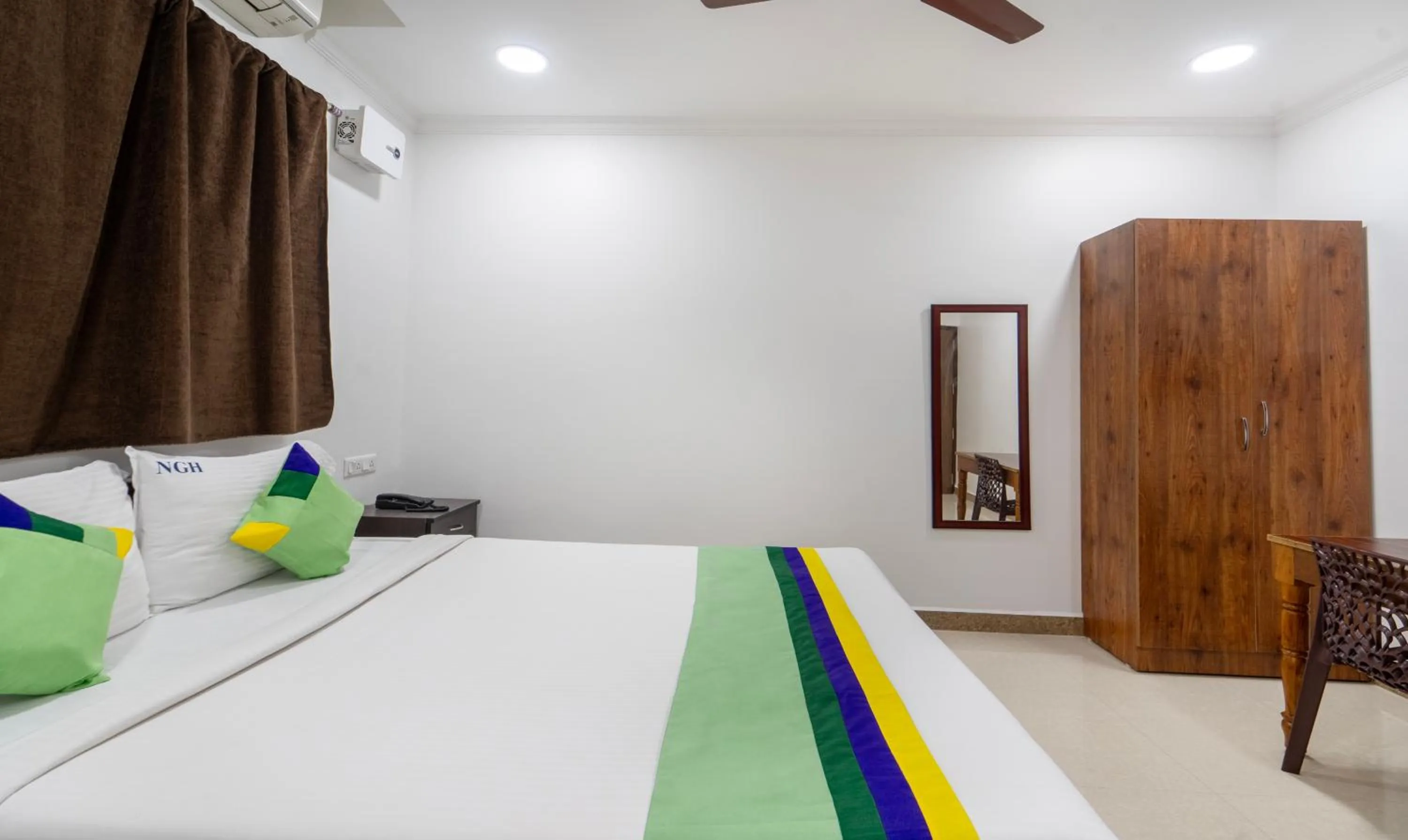 Bed in Treebo NGH Transit