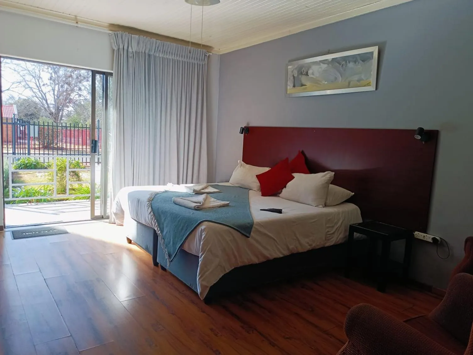 Photo of the whole room, Bed in 21 On Coetzee Guest House