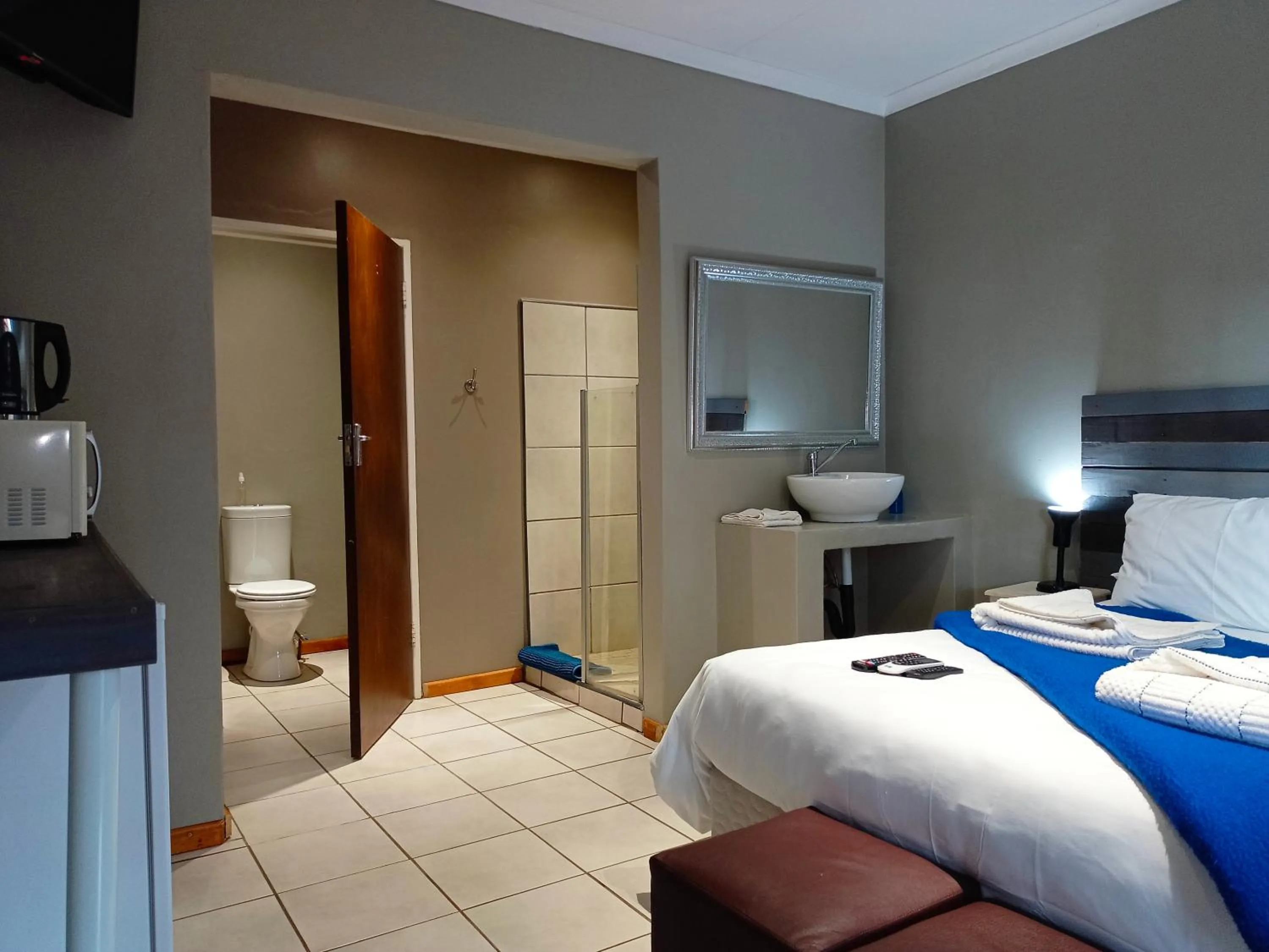 Photo of the whole room, Bed in 21 On Coetzee Guest House