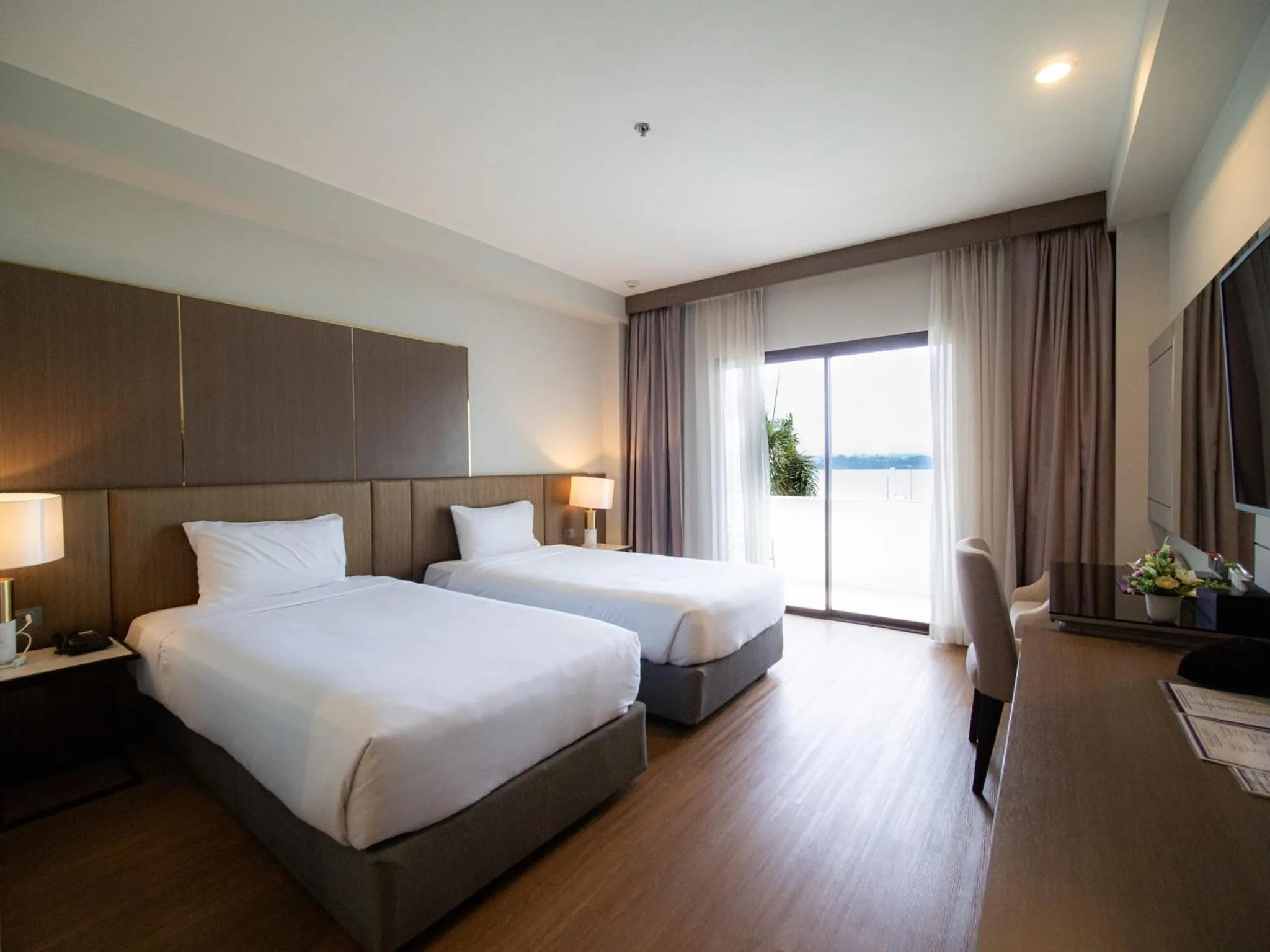 Bed in Fortune River View Hotel Nakhon Phanom