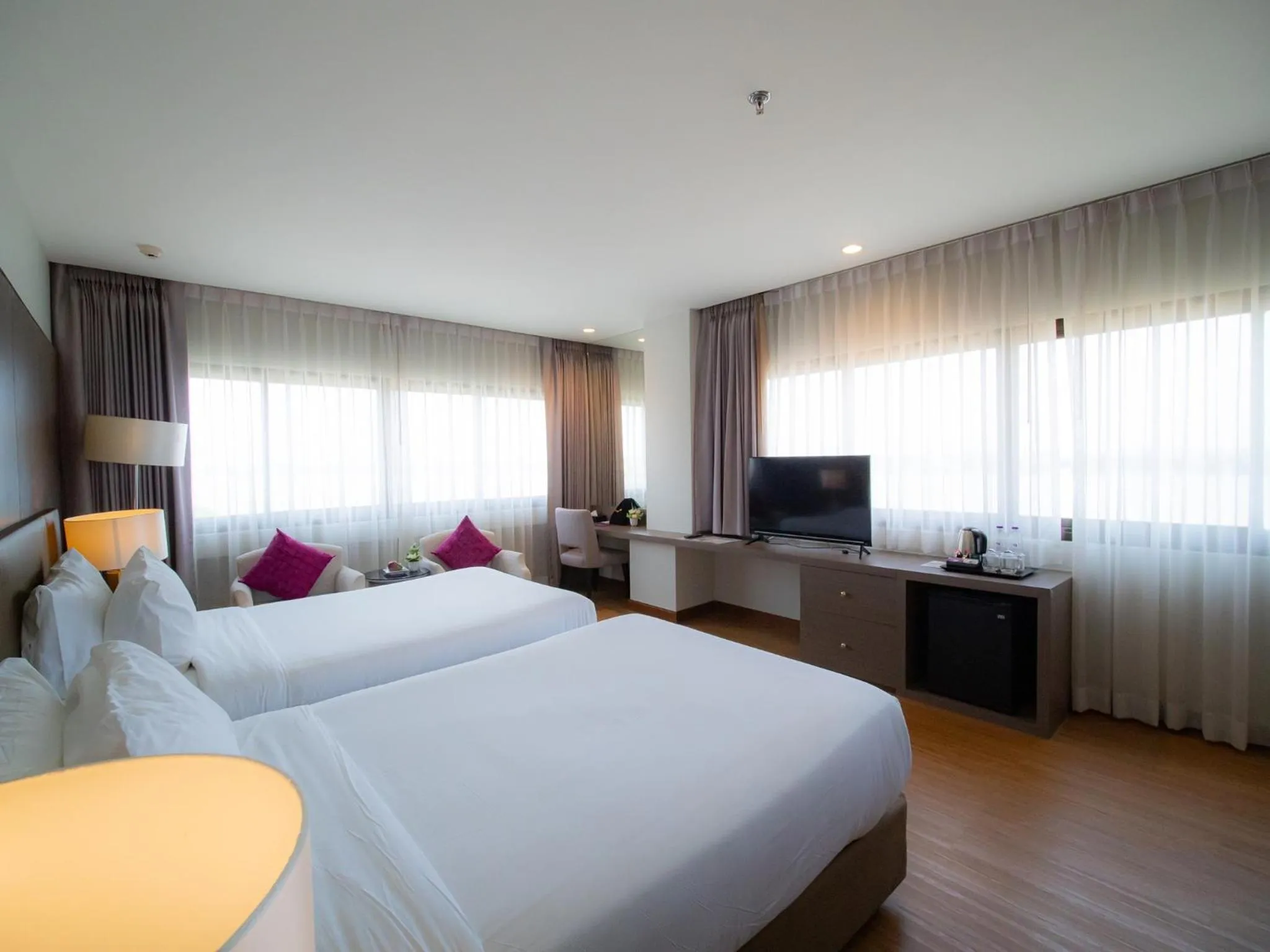Bed in Fortune River View Hotel Nakhon Phanom