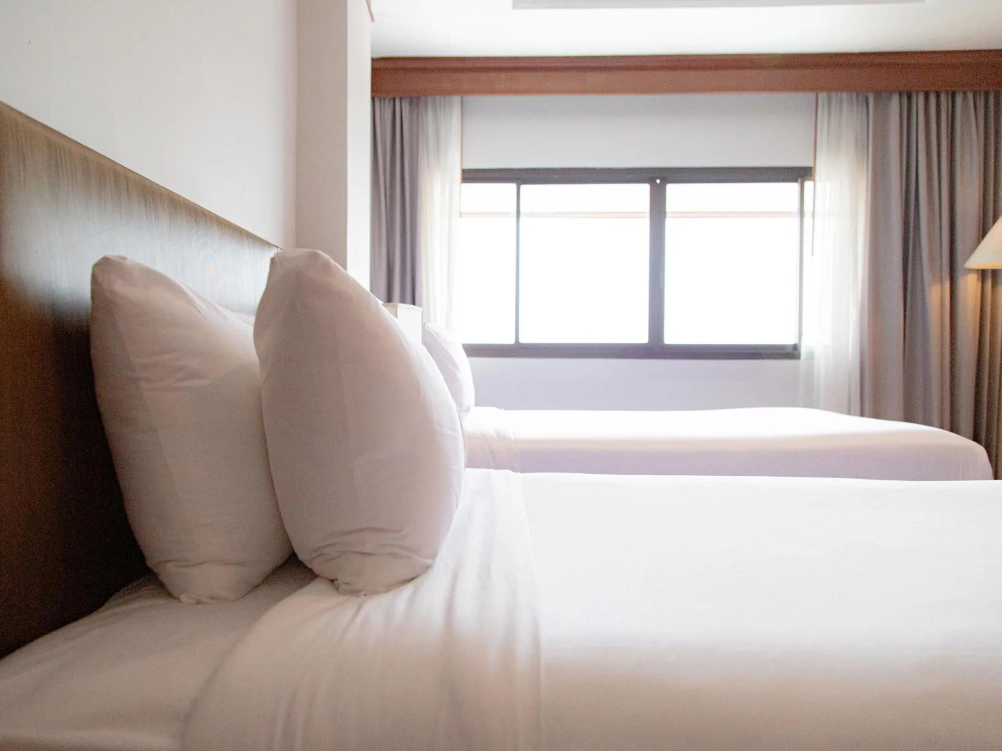 Bed in Fortune River View Hotel Nakhon Phanom