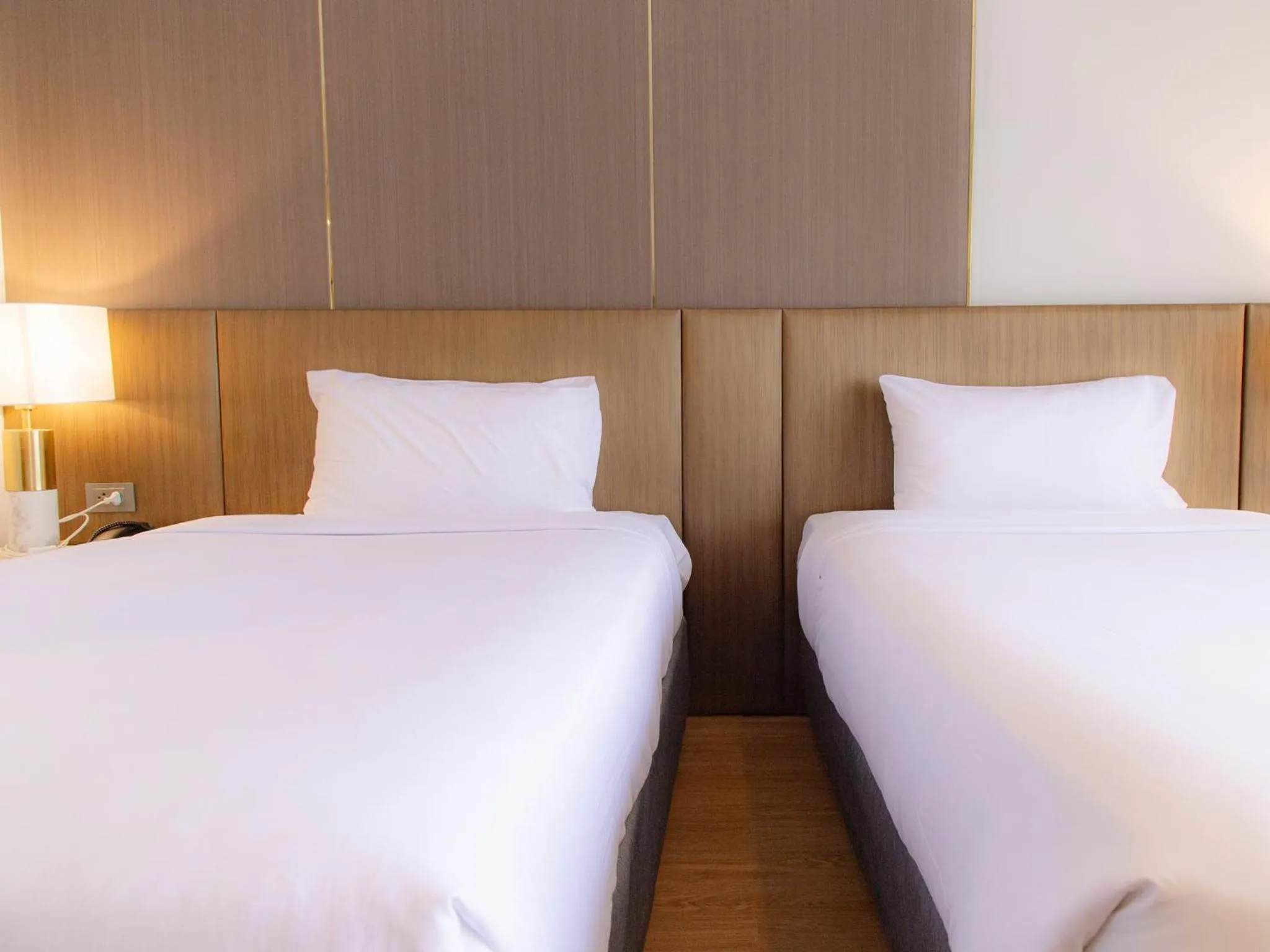 Bed in Fortune River View Hotel Nakhon Phanom