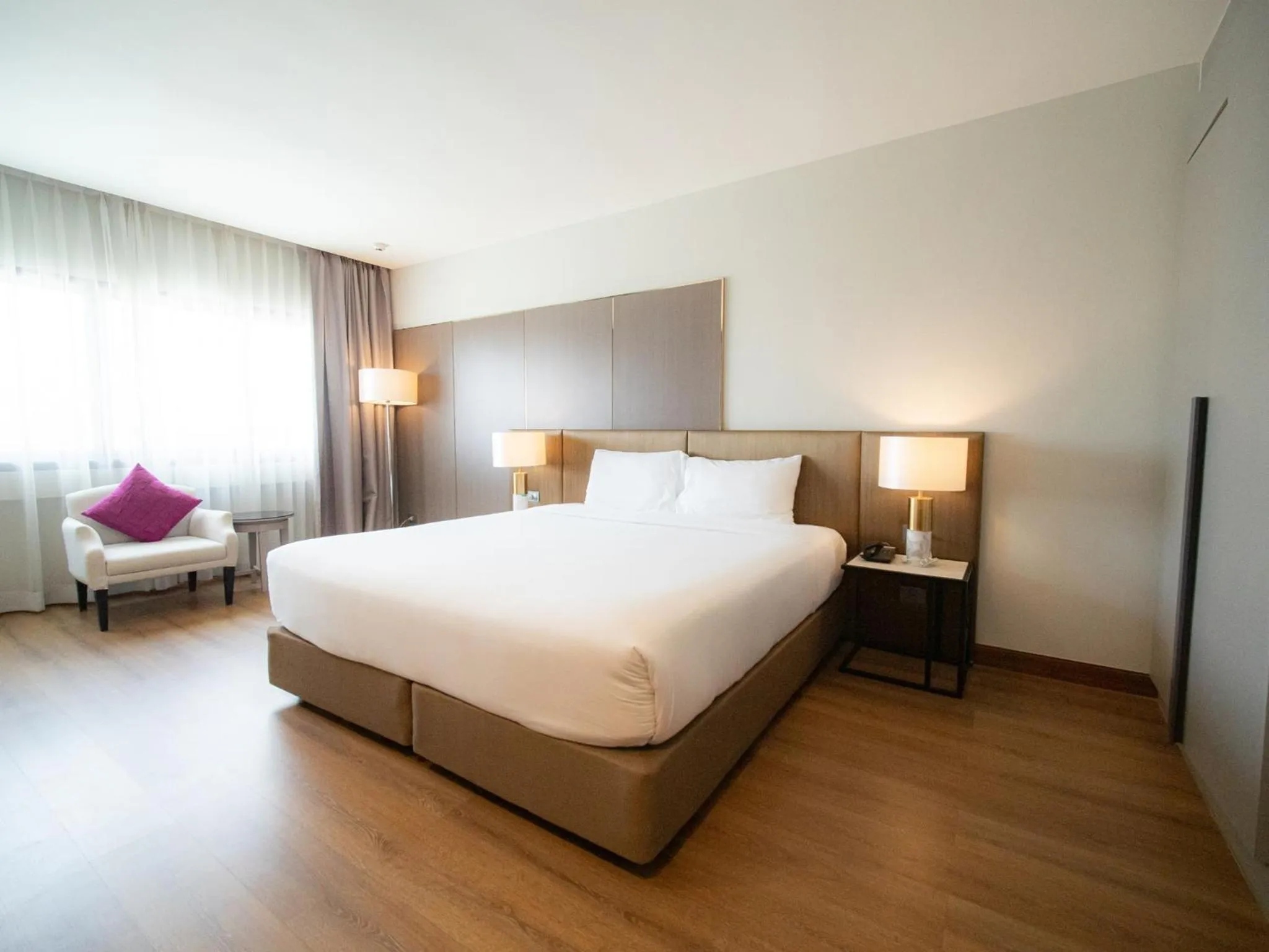 Bed in Fortune River View Hotel Nakhon Phanom