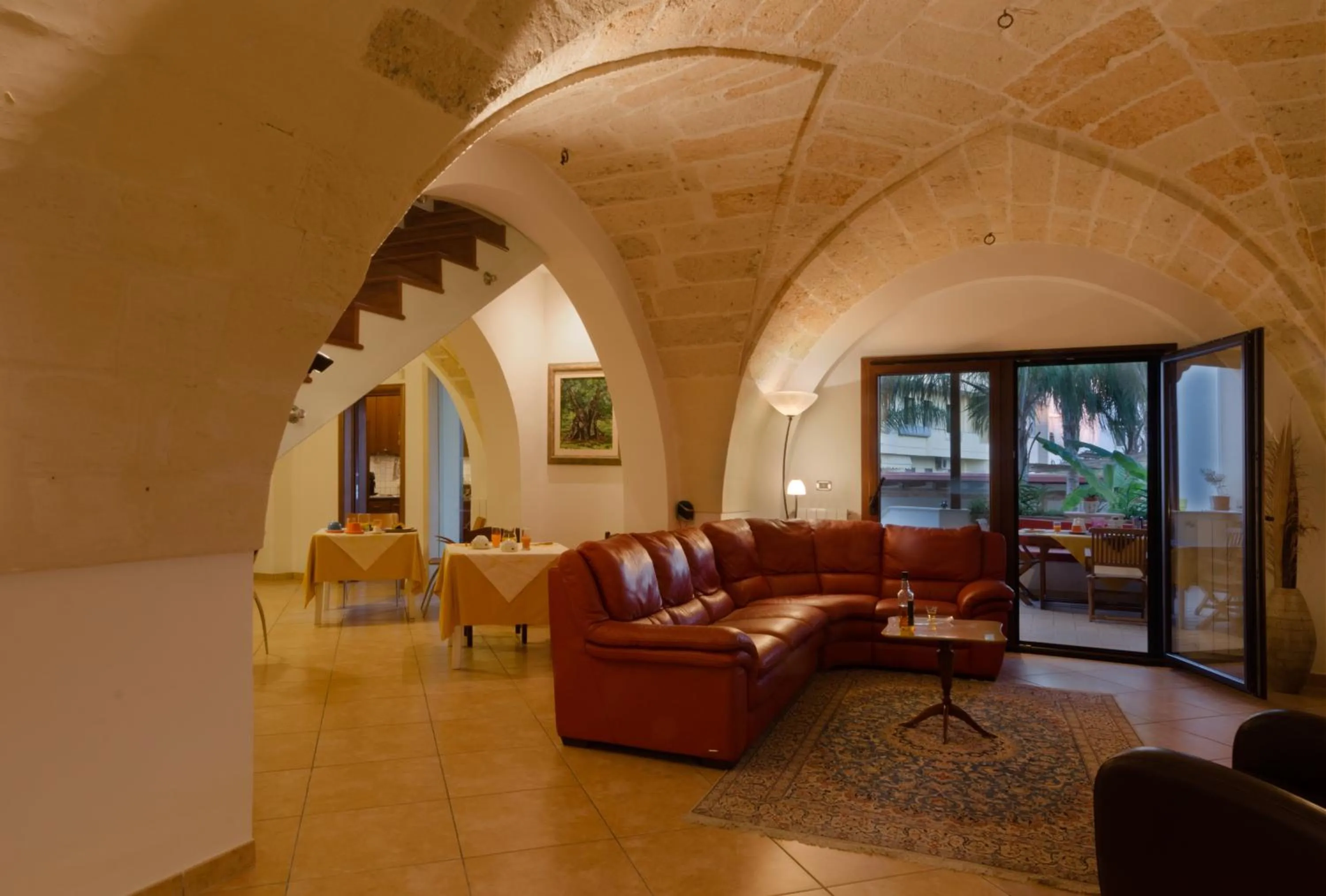 Communal lounge/ TV room in B&B L'Antica Rimessa