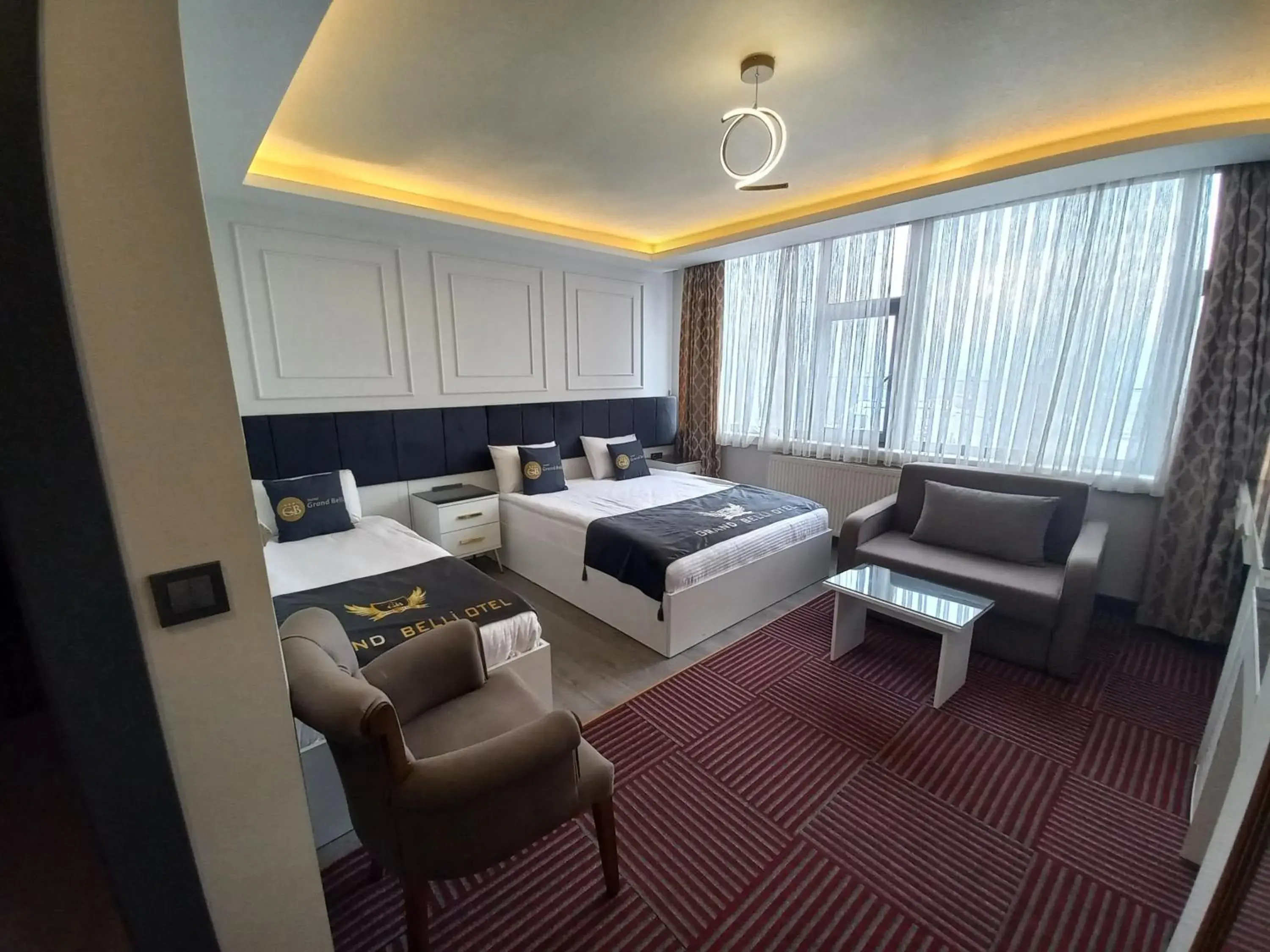 Bed in GRAND BELLİ OTEL Bed in GRAND BELLİ OTEL