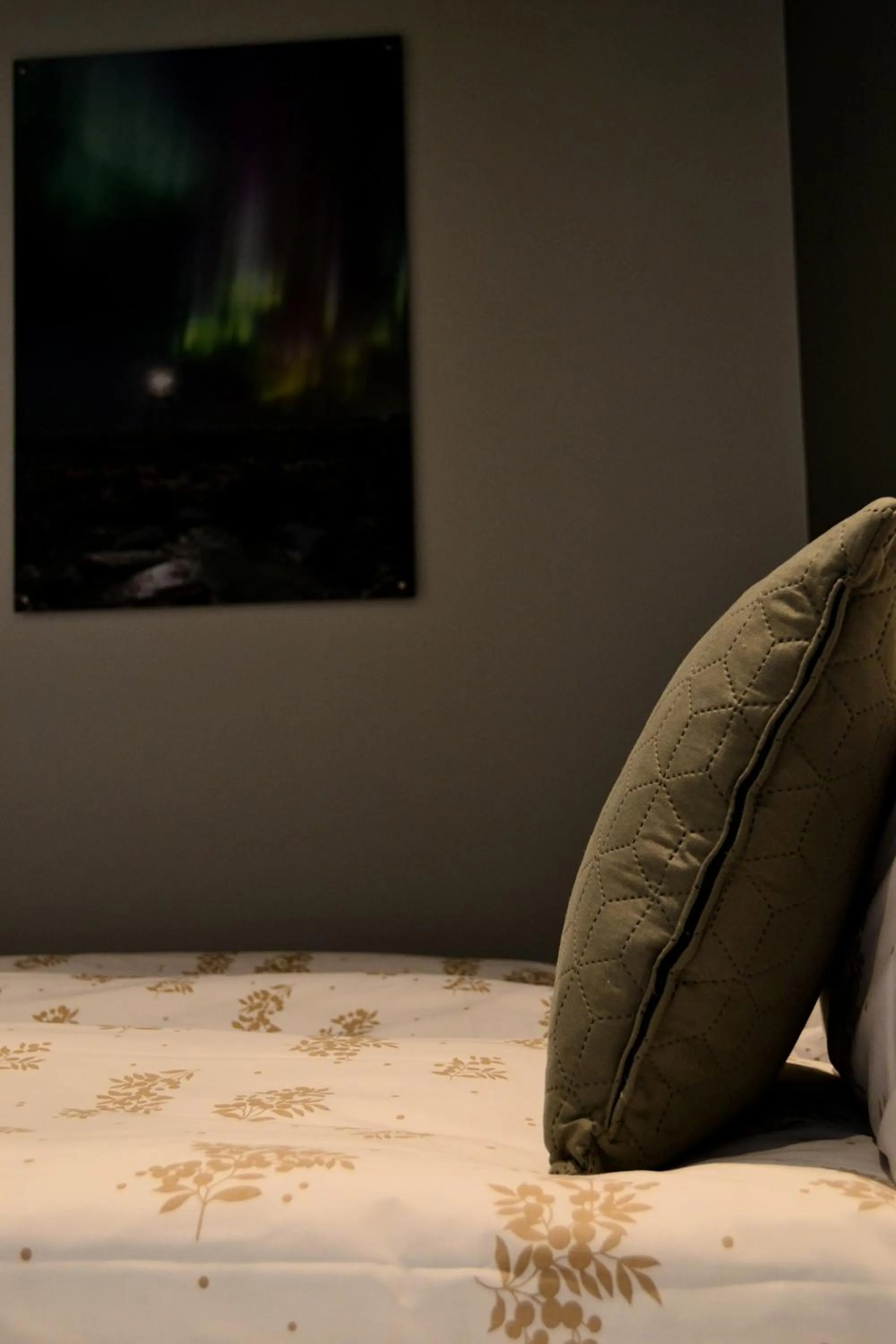 Bed in Andenes Suitehotel