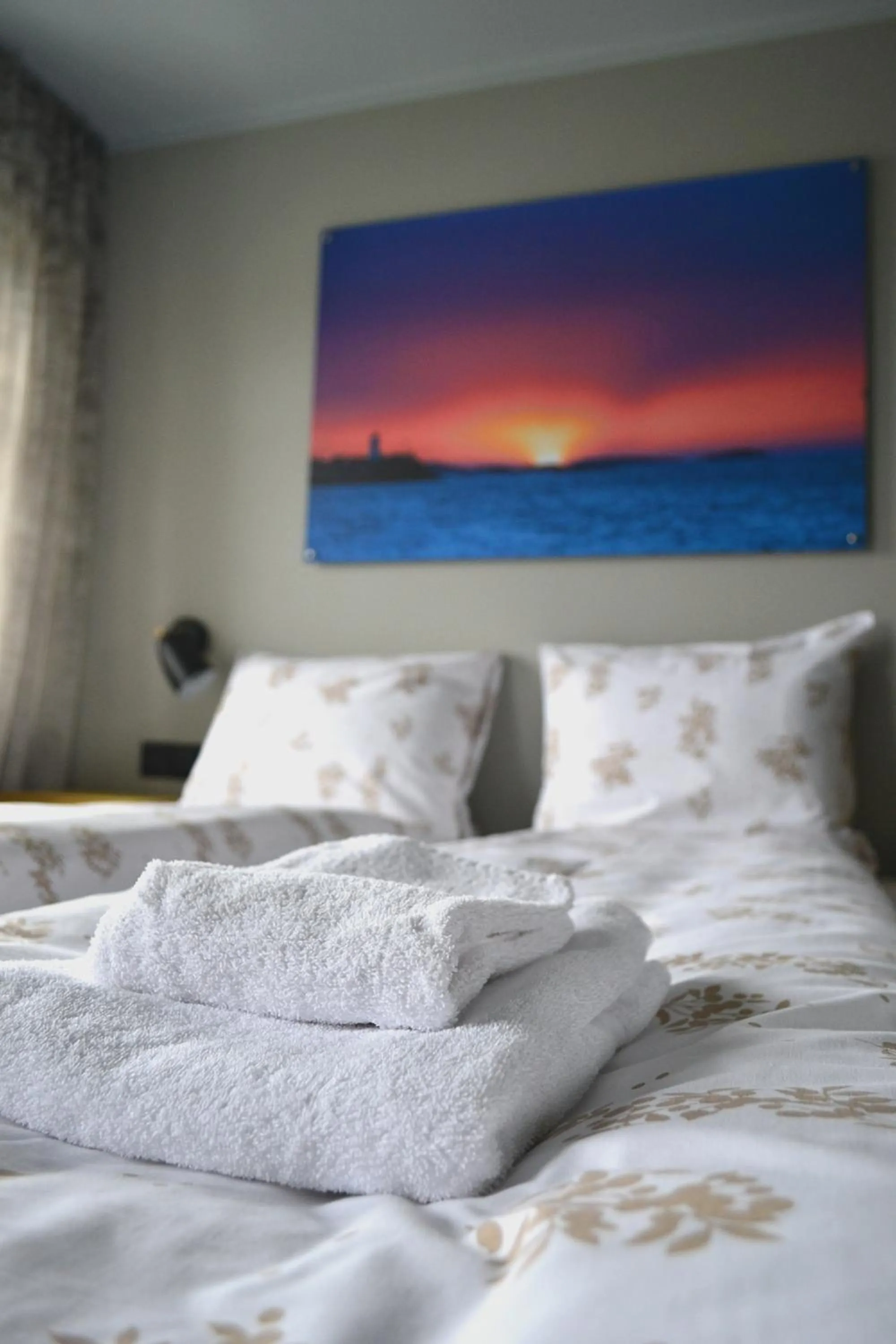 Bed in Andenes Suitehotel