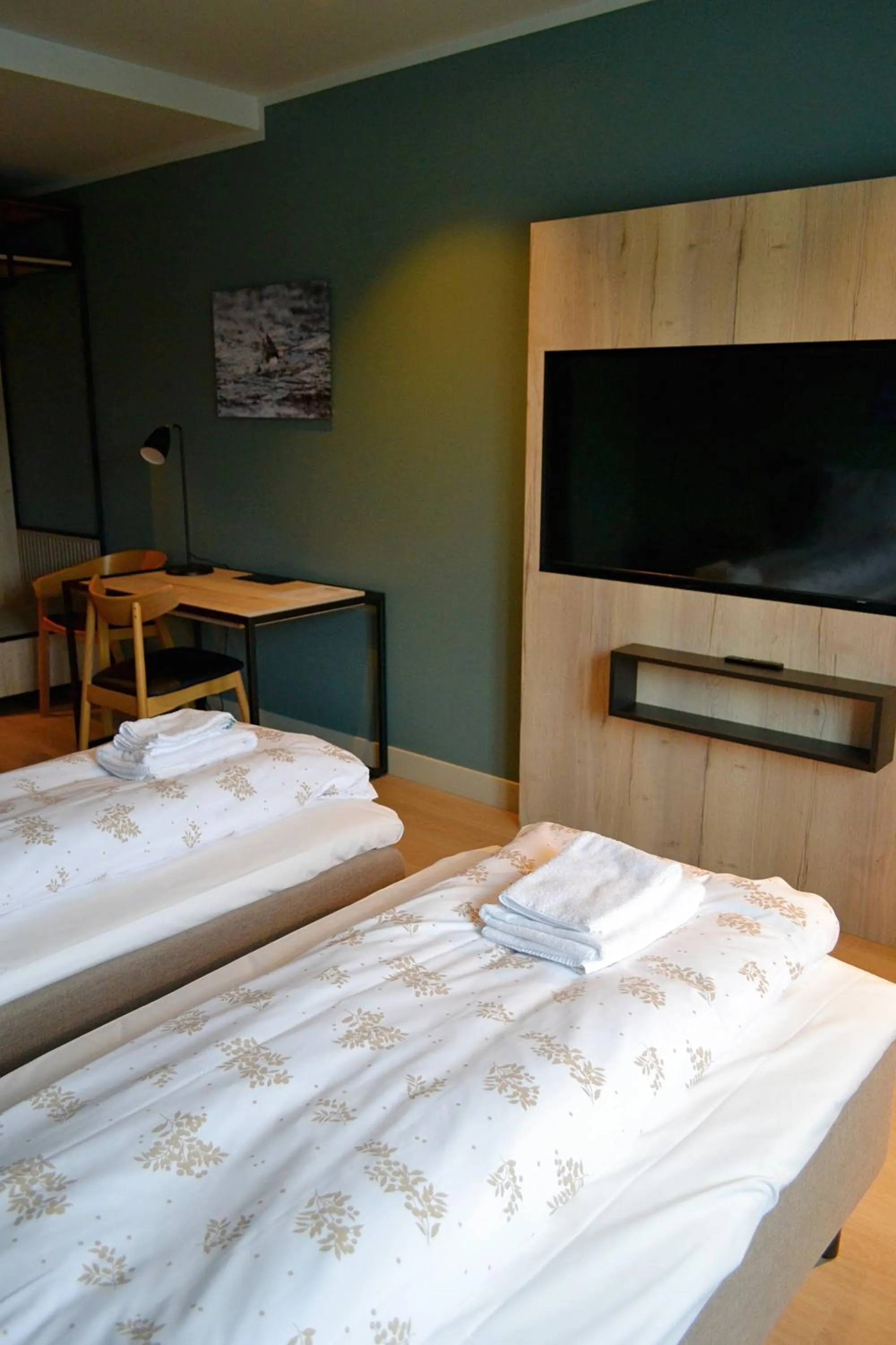 Bed in Andenes Suitehotel