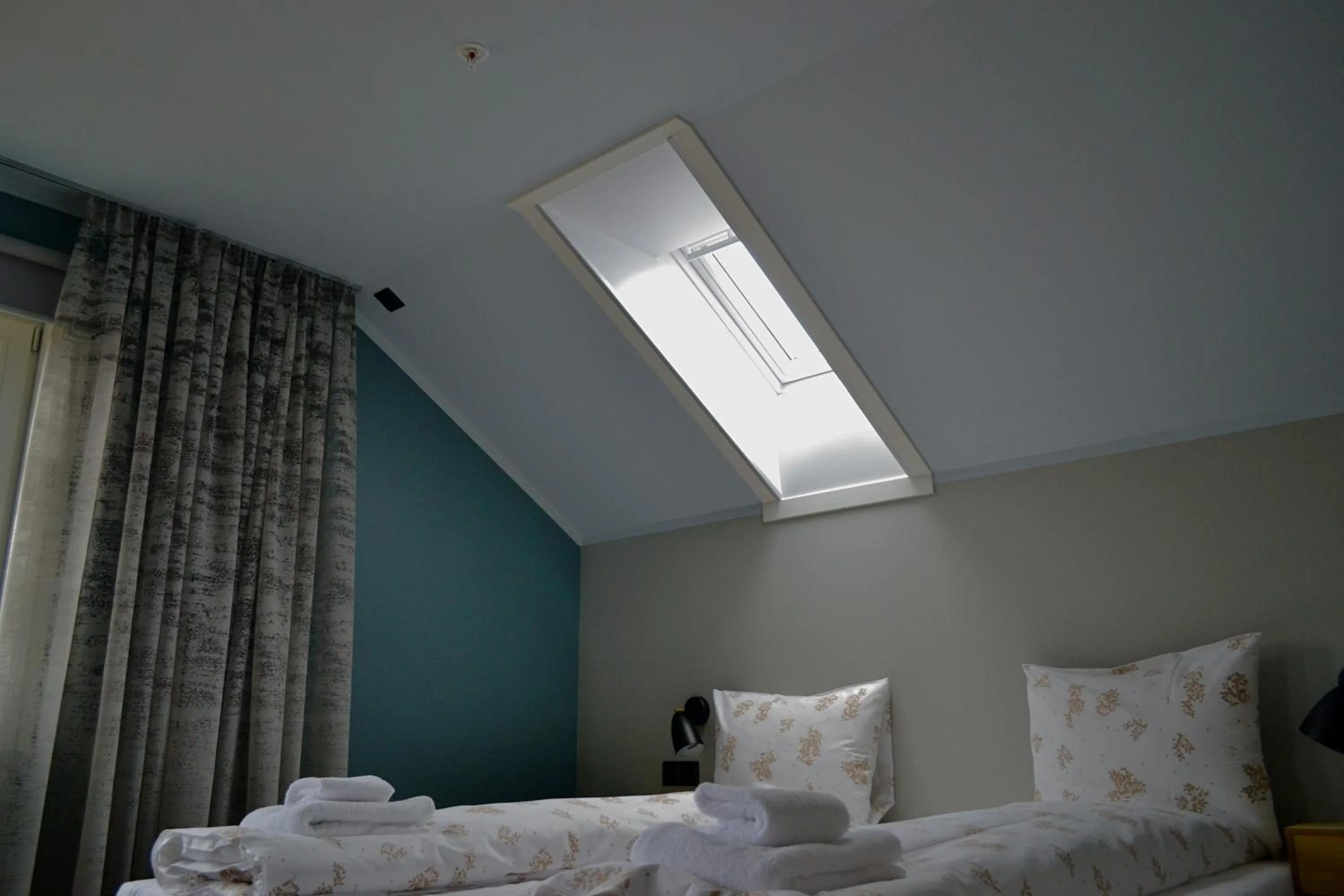 Bed in Andenes Suitehotel