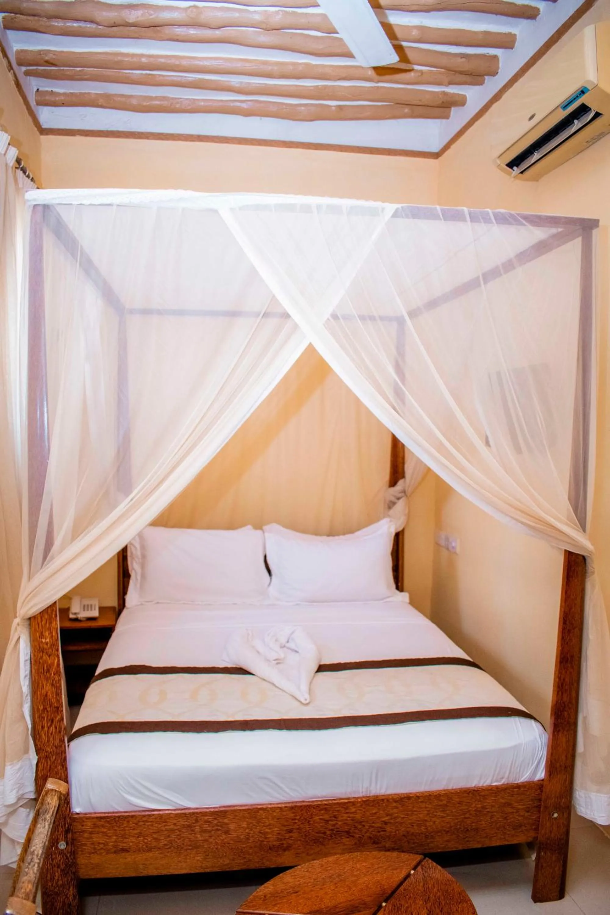 Bed in The Island Stone Town hotel