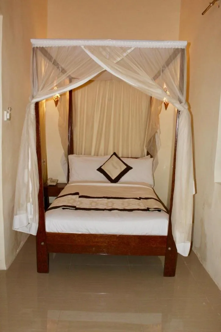 Bed in The Island Stone Town hotel